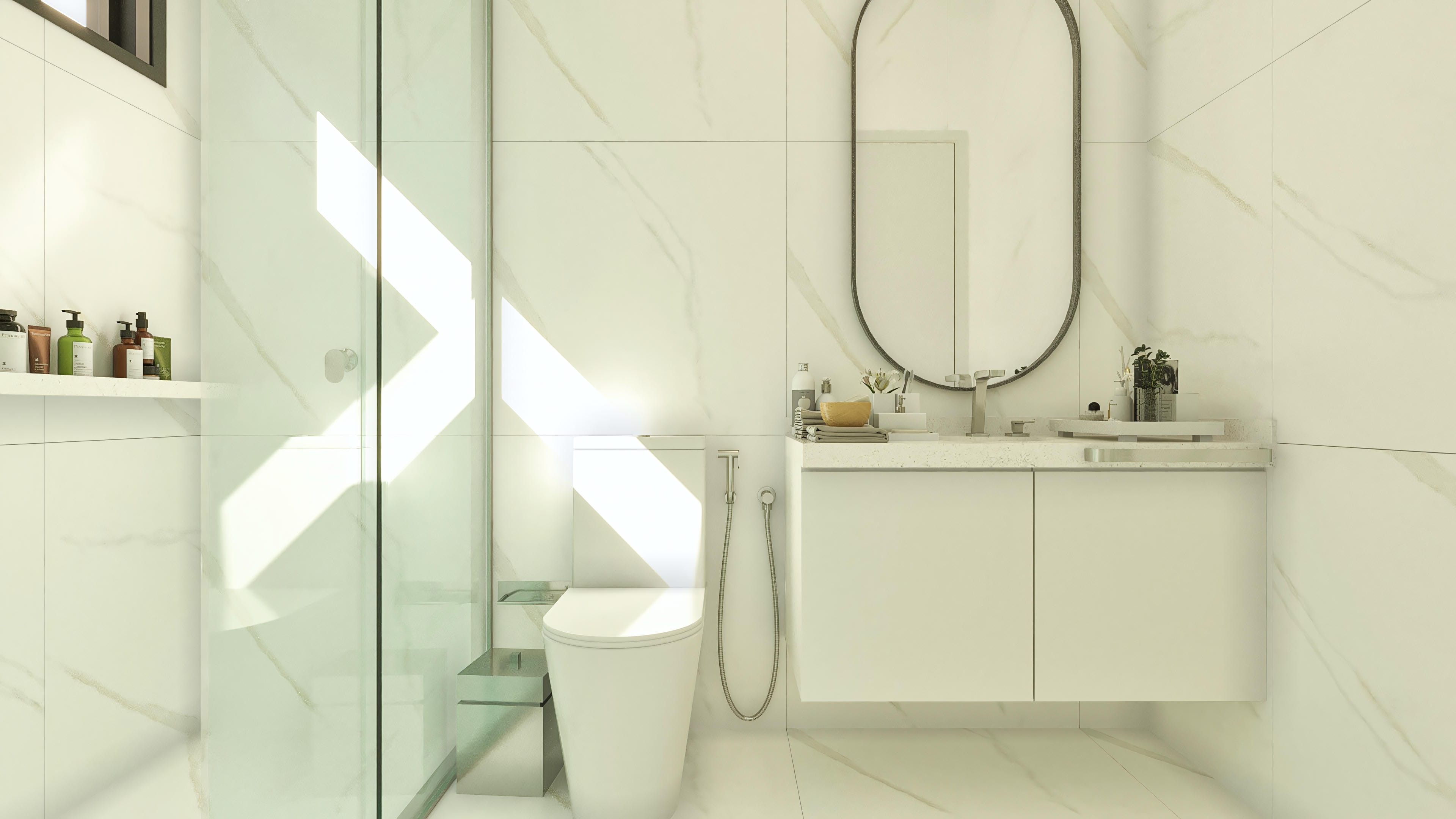 Interior of a modern bathroom with light marble cladding, tempered glass shower enclosure, suspended counter with carved sink, and oval mirror.