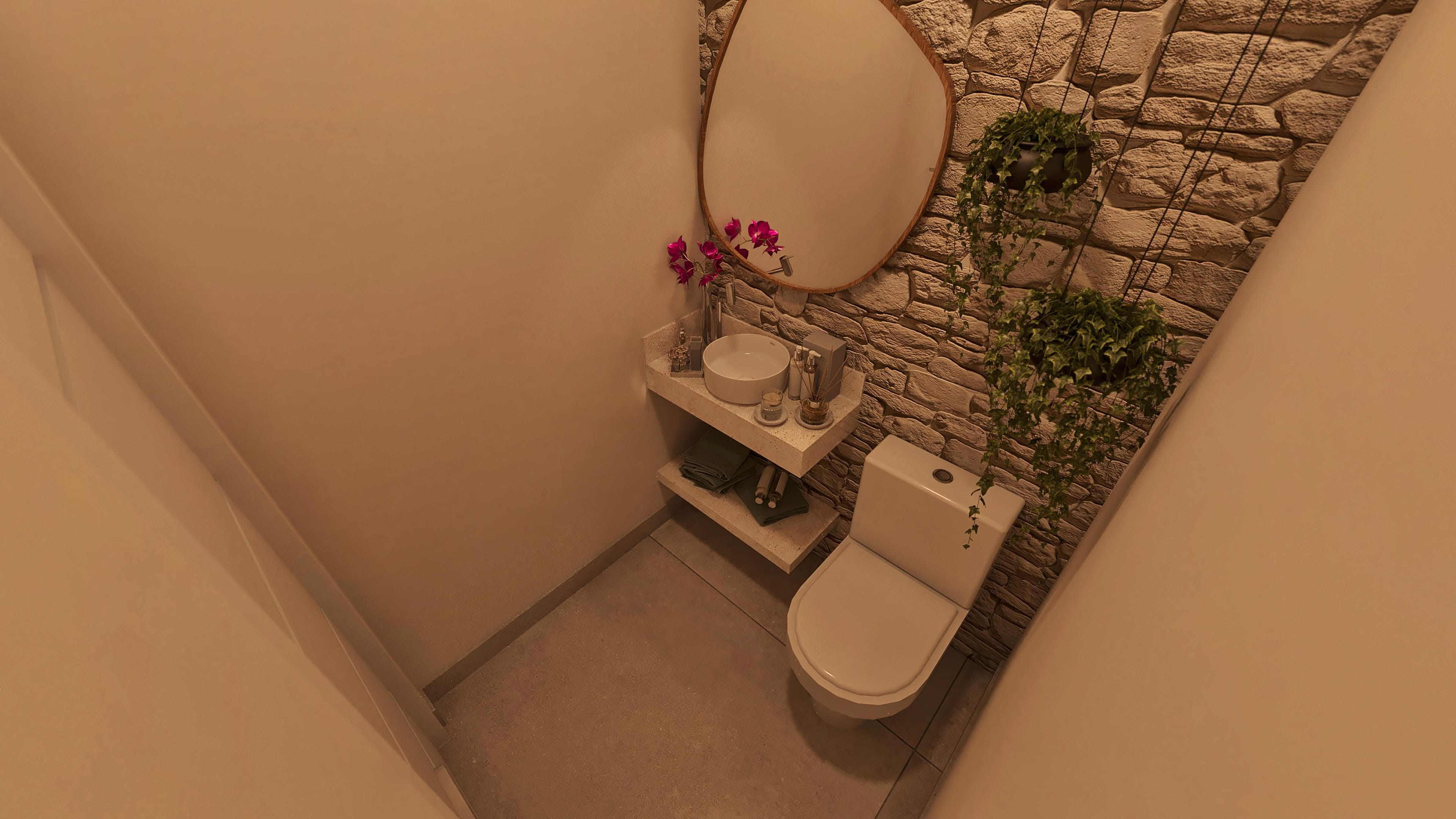 Detail of a bathroom with rustic stone cladding, oval mirror, suspended niche with sink, and white toilet. Elements that refer to a modern single-story house project.