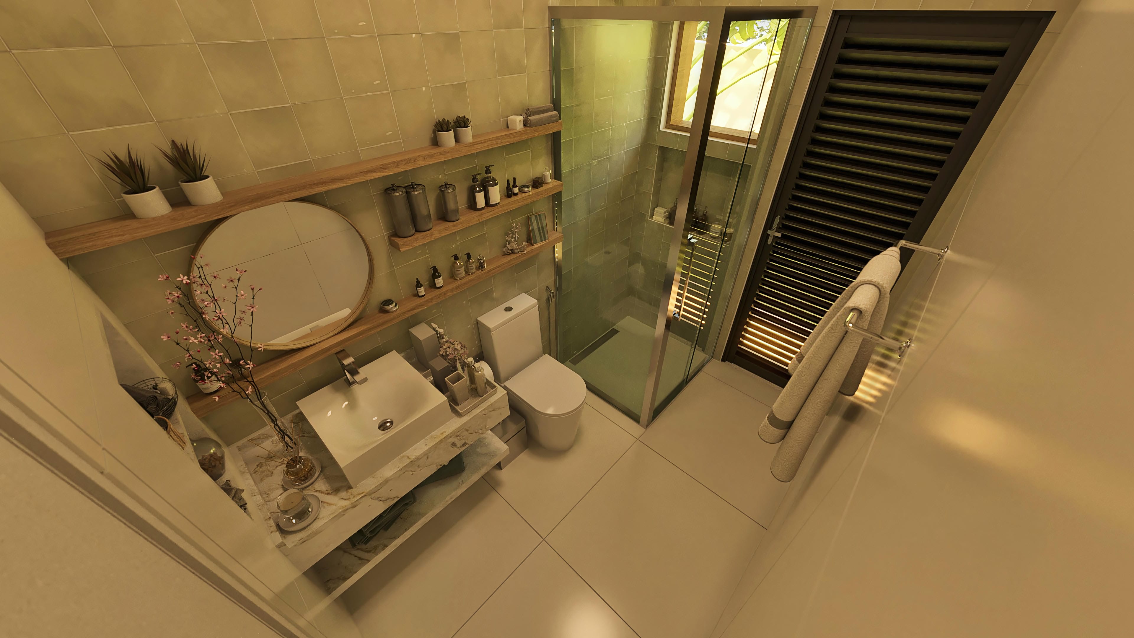 Baño moderno con barra de mármol, espejo redondo, sanitarios y cabina con vidrio templado, con toallas y objetos de decoración.
