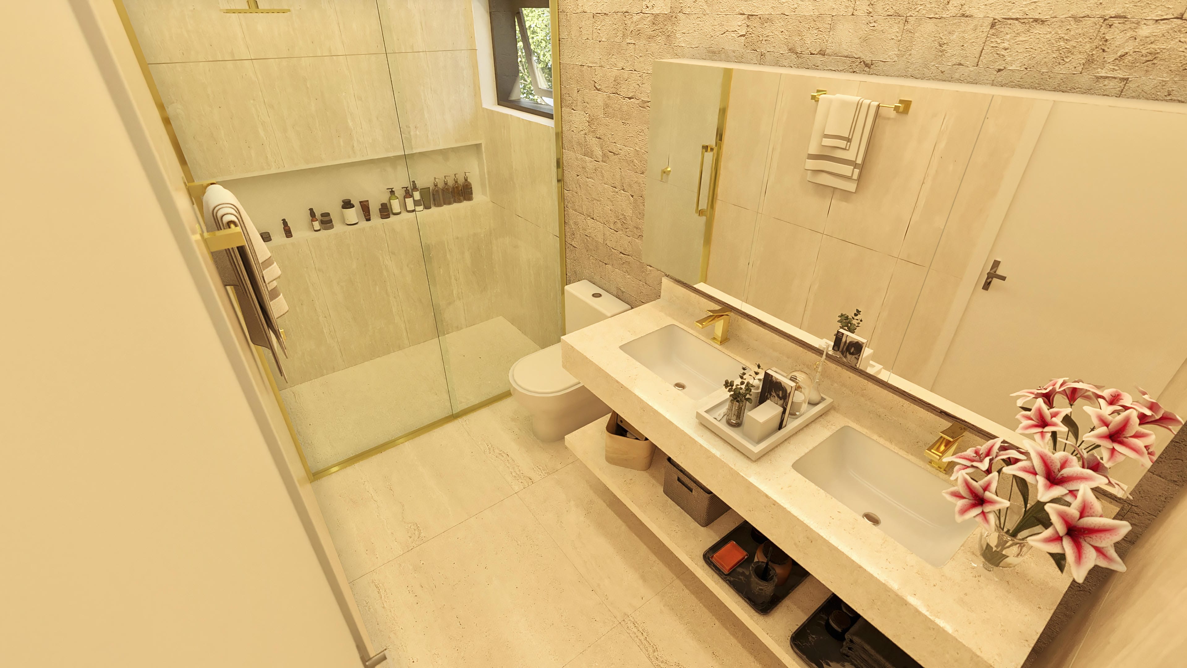 Details of a bathroom with a light marble double countertop and recessed sinks, gold fixtures, and mirror niche. Wall cladding with exposed stone texture.