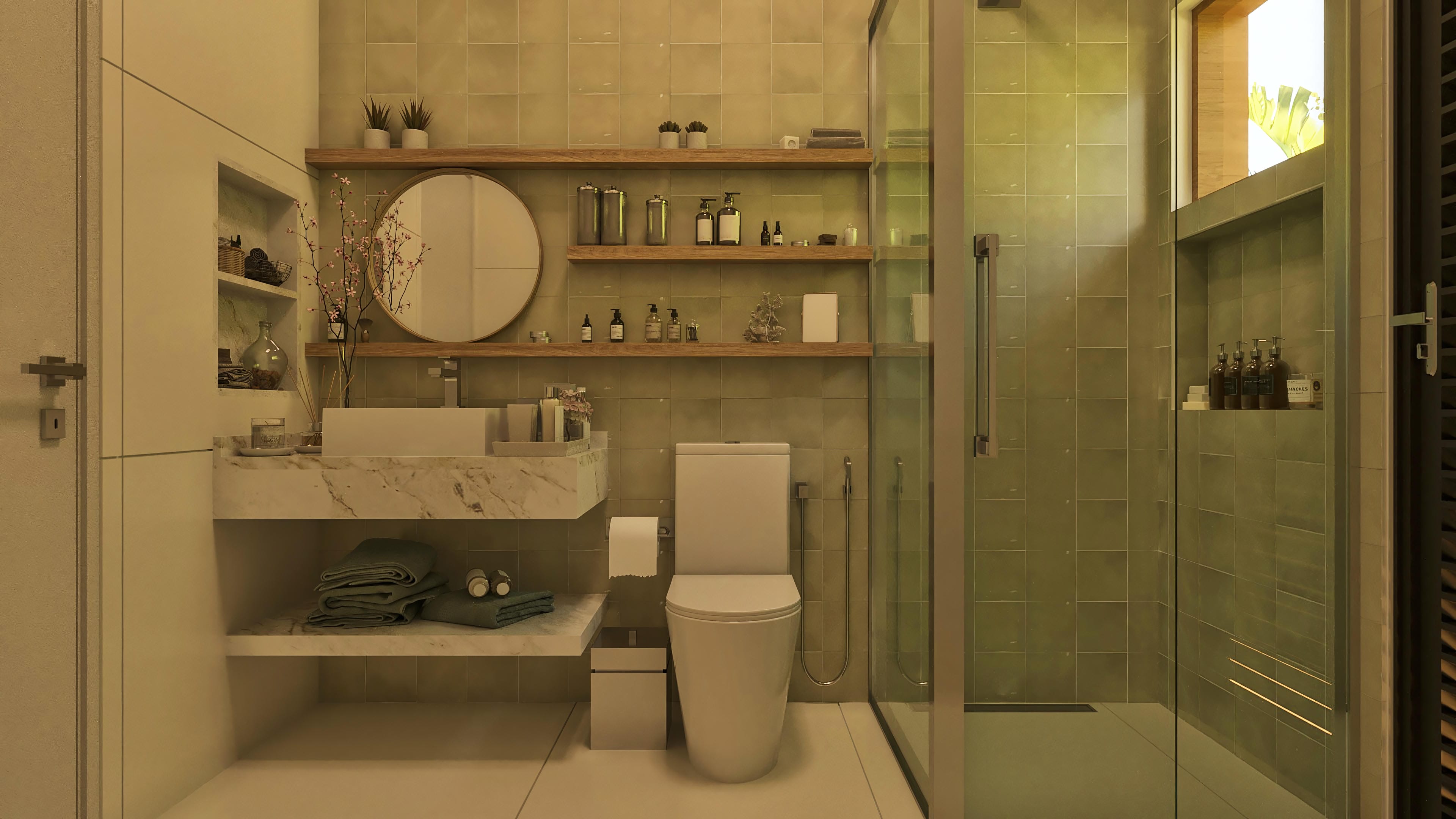 Detalle de un baño moderno con revestimento en azulejos verdes, barra de mármol con lavabo integrado y repisas de madera.