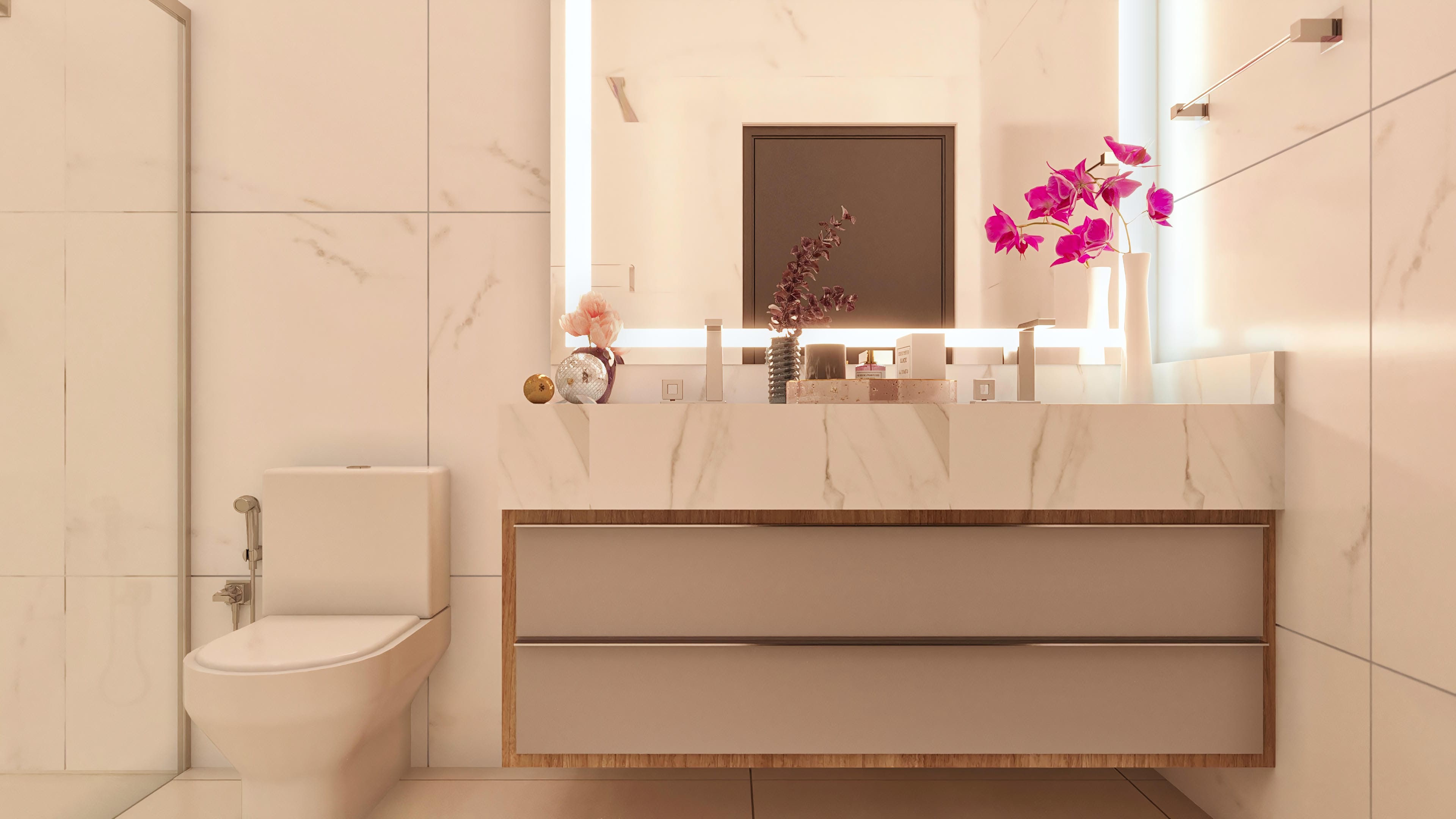 Modern bathroom with light marble cladding on the walls, a marble countertop with subtle veins, and cabinetry in a neutral tone. Highlight on recessed lighting and a large mirror.