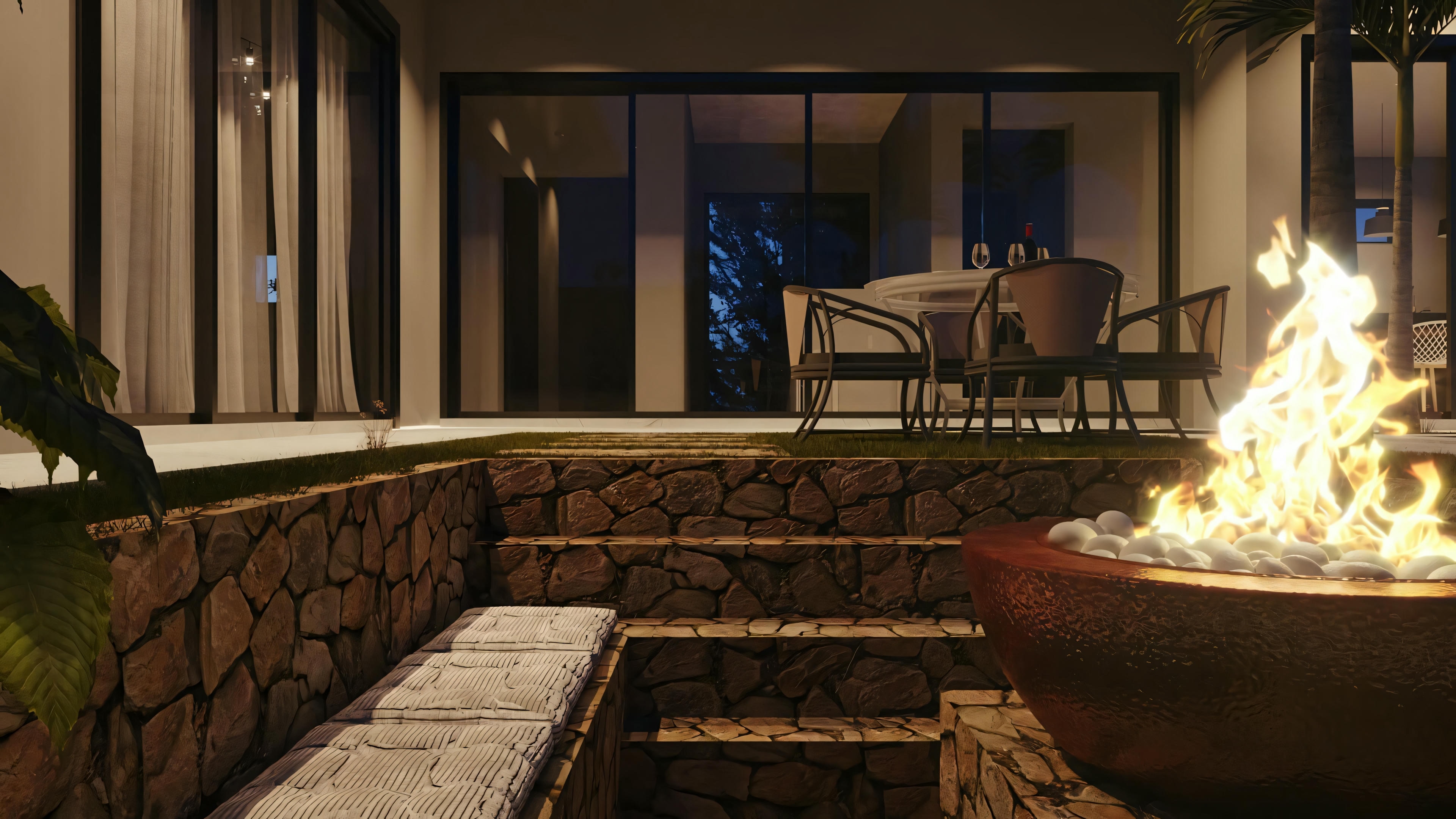 Outdoor patio area with seating around a fire pit, adjacent to a residential structure.