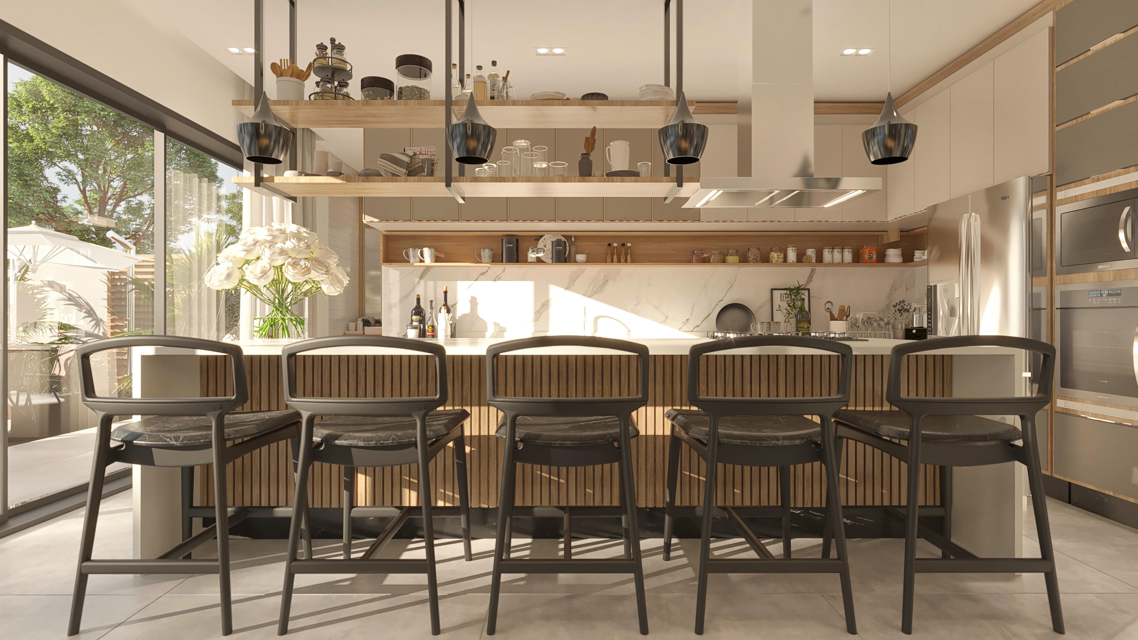 Interior de cocina moderna con isla central, encimera de mármol, armarios a medida y techos altos con ventanas de cristal.