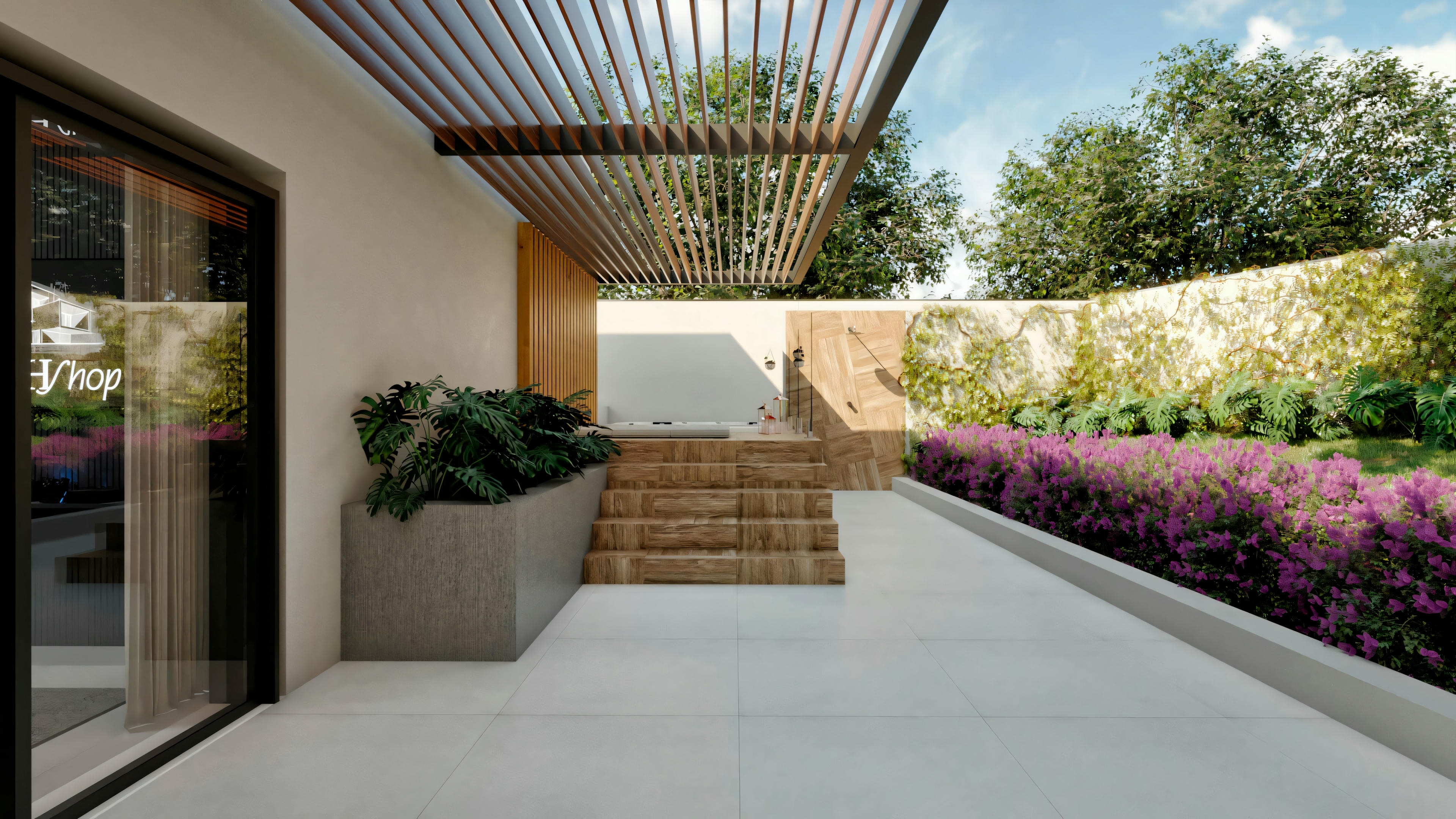 Área externa com cobertura, cercada por vegetação exuberante e plantas com flores. Móveis de exterior visíveis, sugerindo um espaço para relaxamento ou socialização.