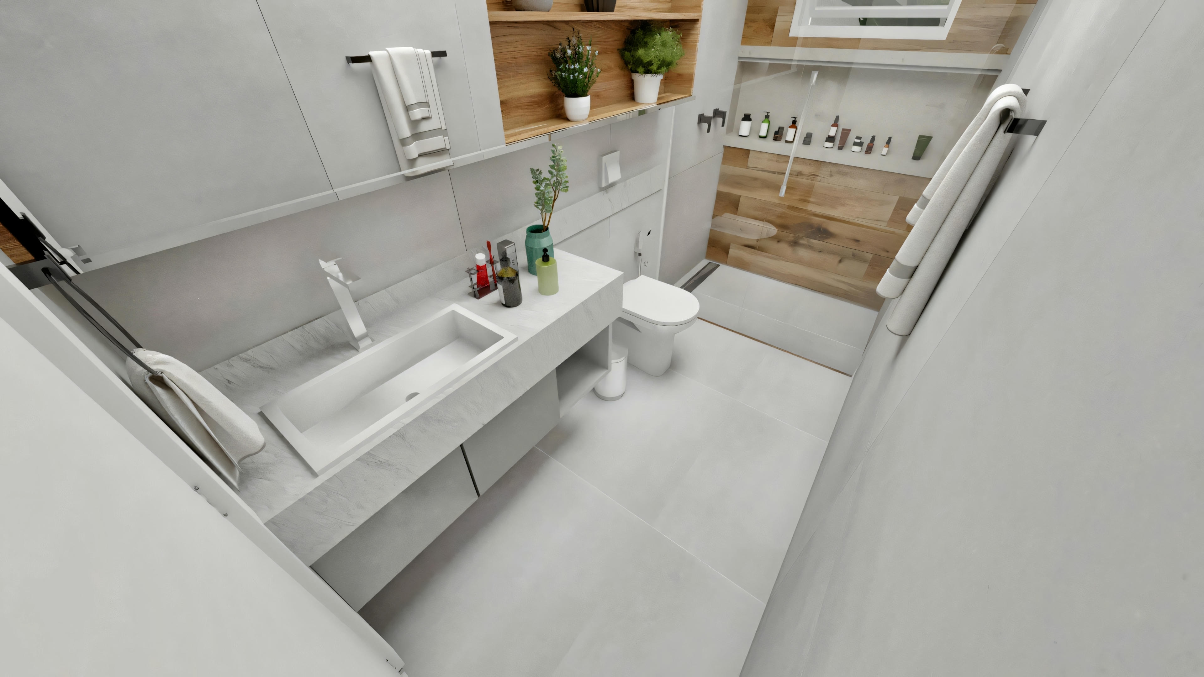 Cuarto de baño moderno con revestimiento de gres porcelánico estilo cemento pulido, encimera suspendida con lavabo tallado, inodoro suspendido, hornacinas de madera sobre el inodoro, mampara de ducha de cristal y pared de la ducha con revestimiento amaderado.