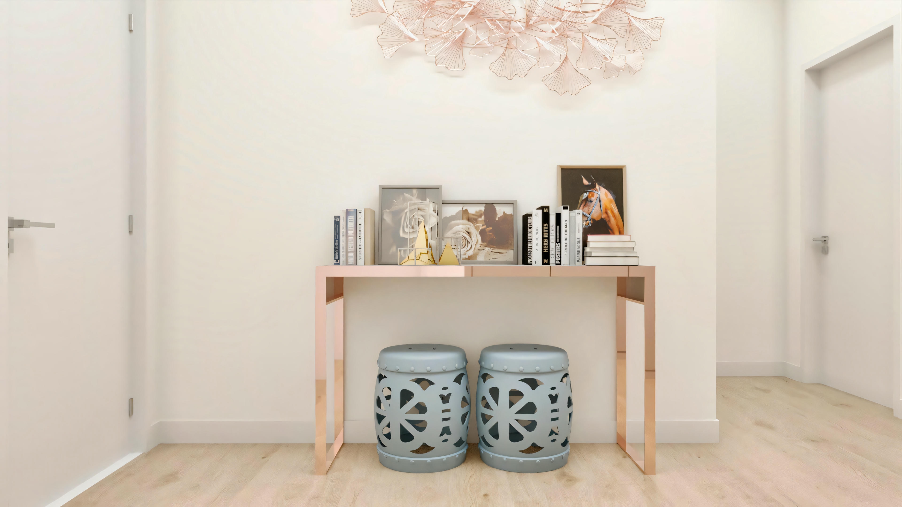 Decorated entrance hall or hallway in a ready-made project with 5 suites, with a minimalist design metal console table, ceramic garden-style stools, and decoration with books, paintings, and wall panel.
