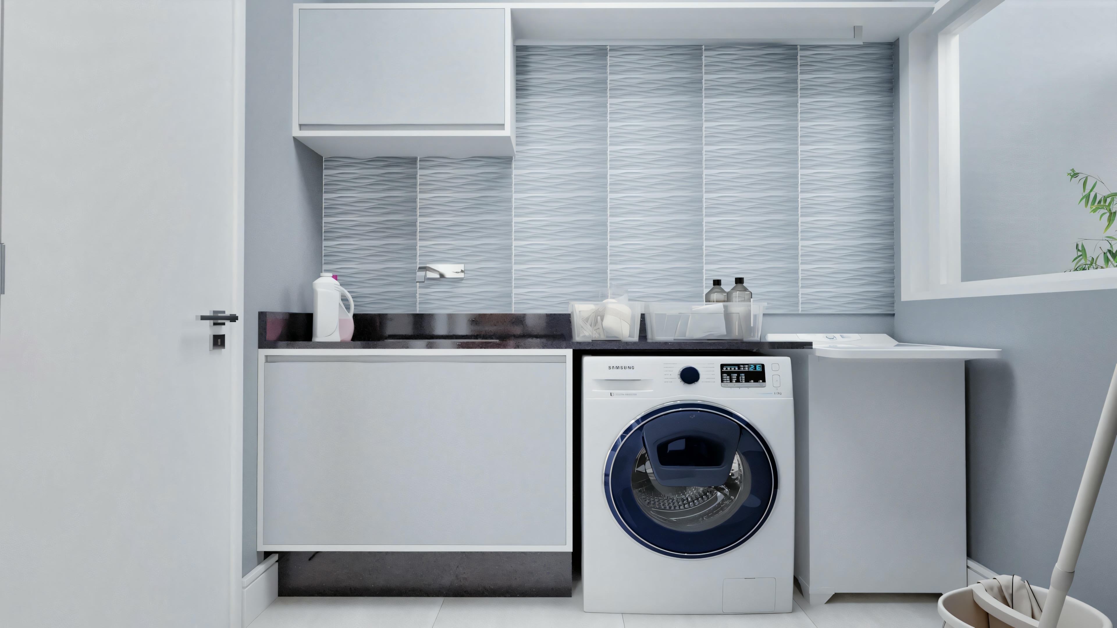 A modern laundry room with white walls, a washing machine, a sink, and cabinets. There is also a window with partially closed blinds.