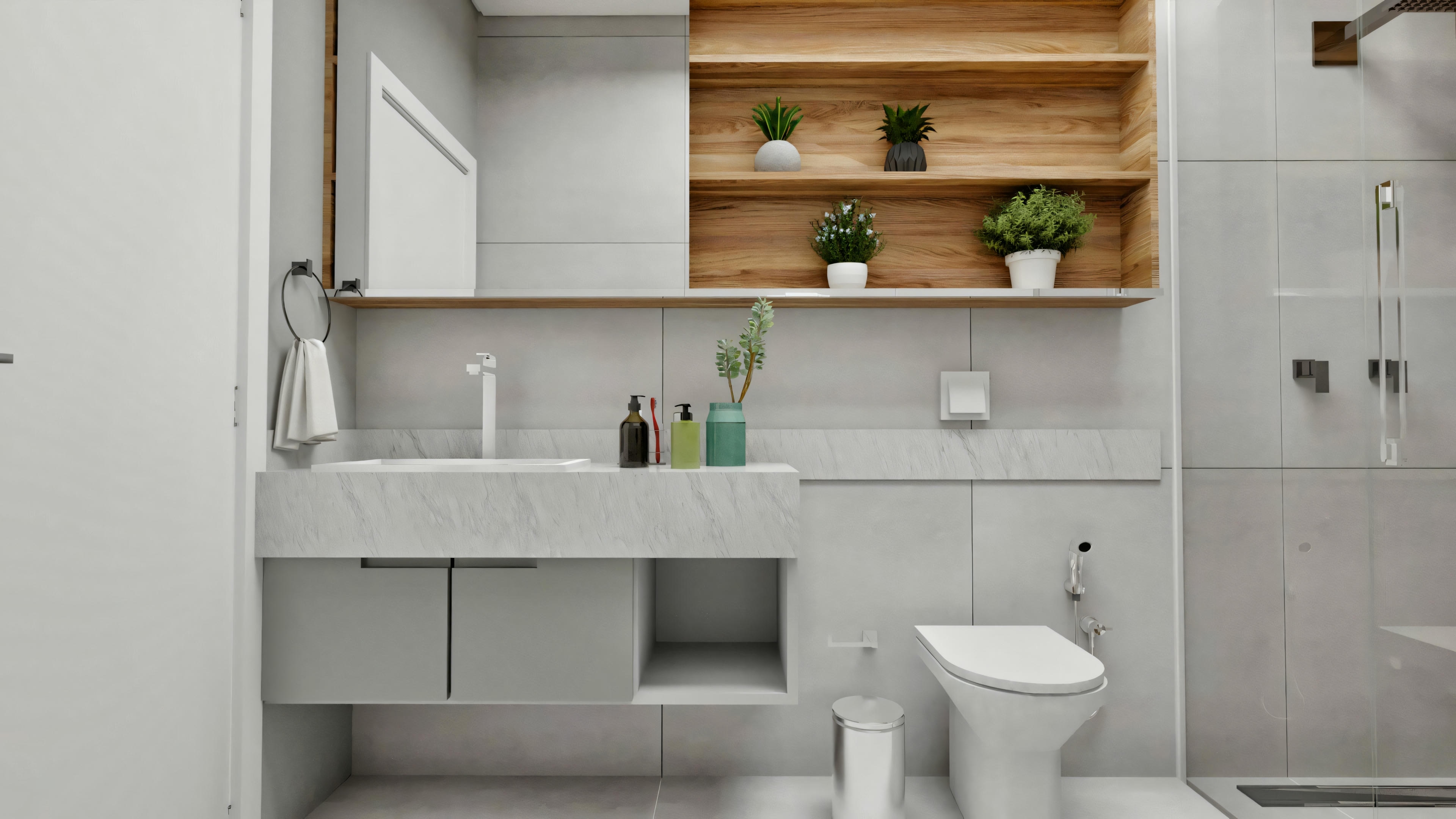 Vista frontal del cuarto de baño moderno con encimera suspendida y lavabo tallado en material estilo hormigón, armarios inferiores, espejo, hornacinas de madera con plantas sobre el inodoro suspendido, y revestimiento de pared gris.
