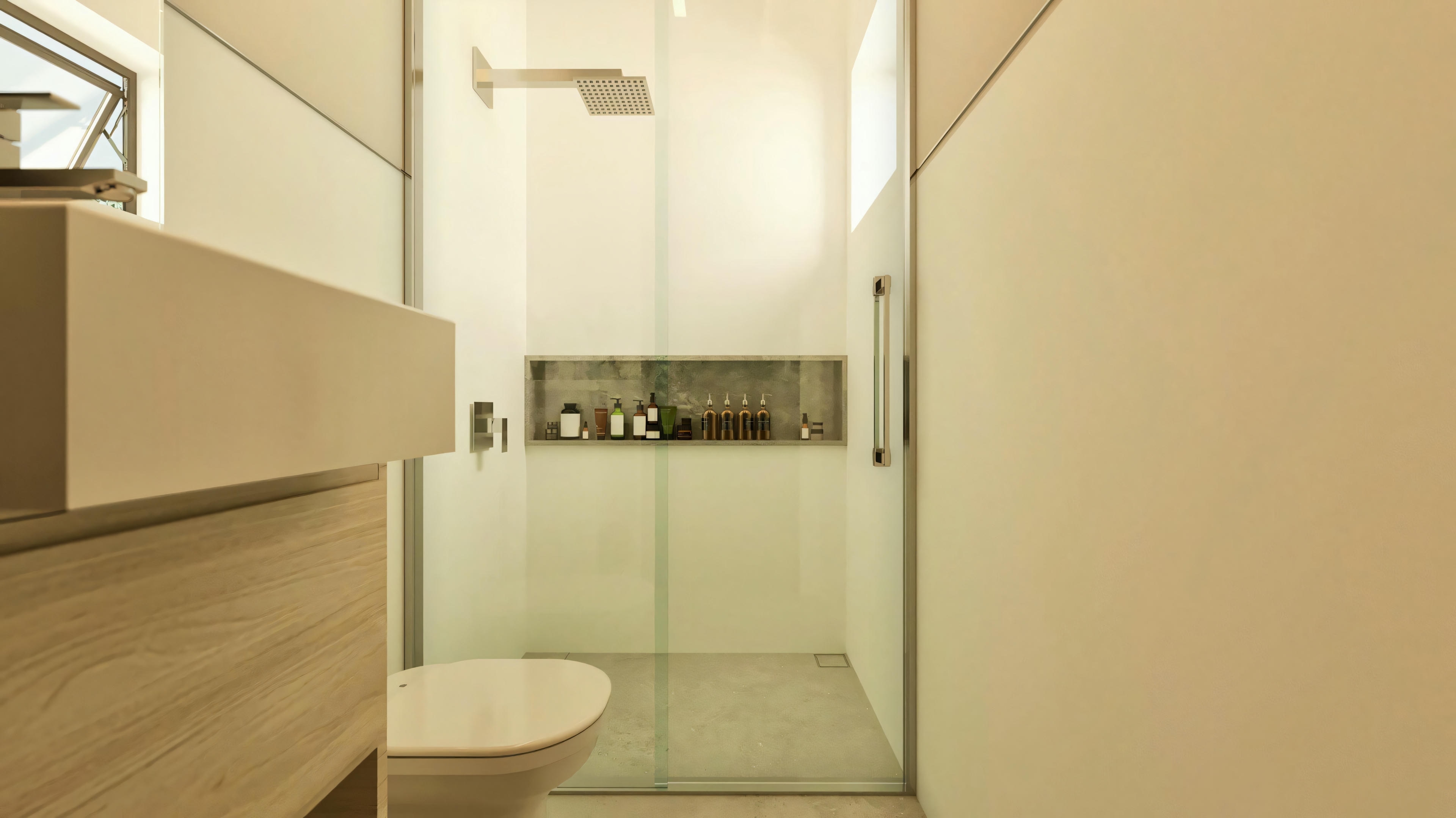 Shower stall area of a bathroom in the two-story house project, with a ceiling or high wall shower, built-in niche in the wall for products, and transparent glass enclosure.
