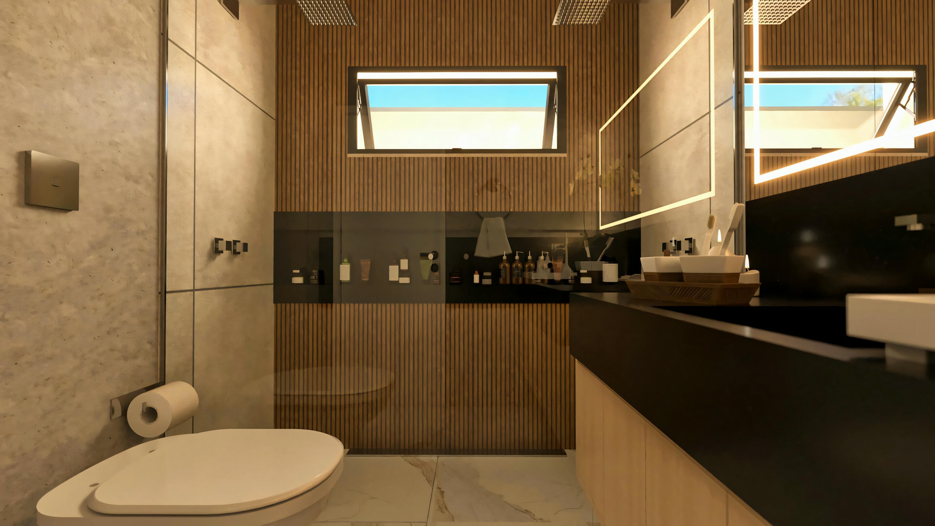 Full view of the modern bathroom of one of the 3 suites of the bungalow house. Includes toilet, dark vanity, wood-finish cabinet, illuminated mirror, and shower stall with slatted niche. A 3-suite bungalow house project.