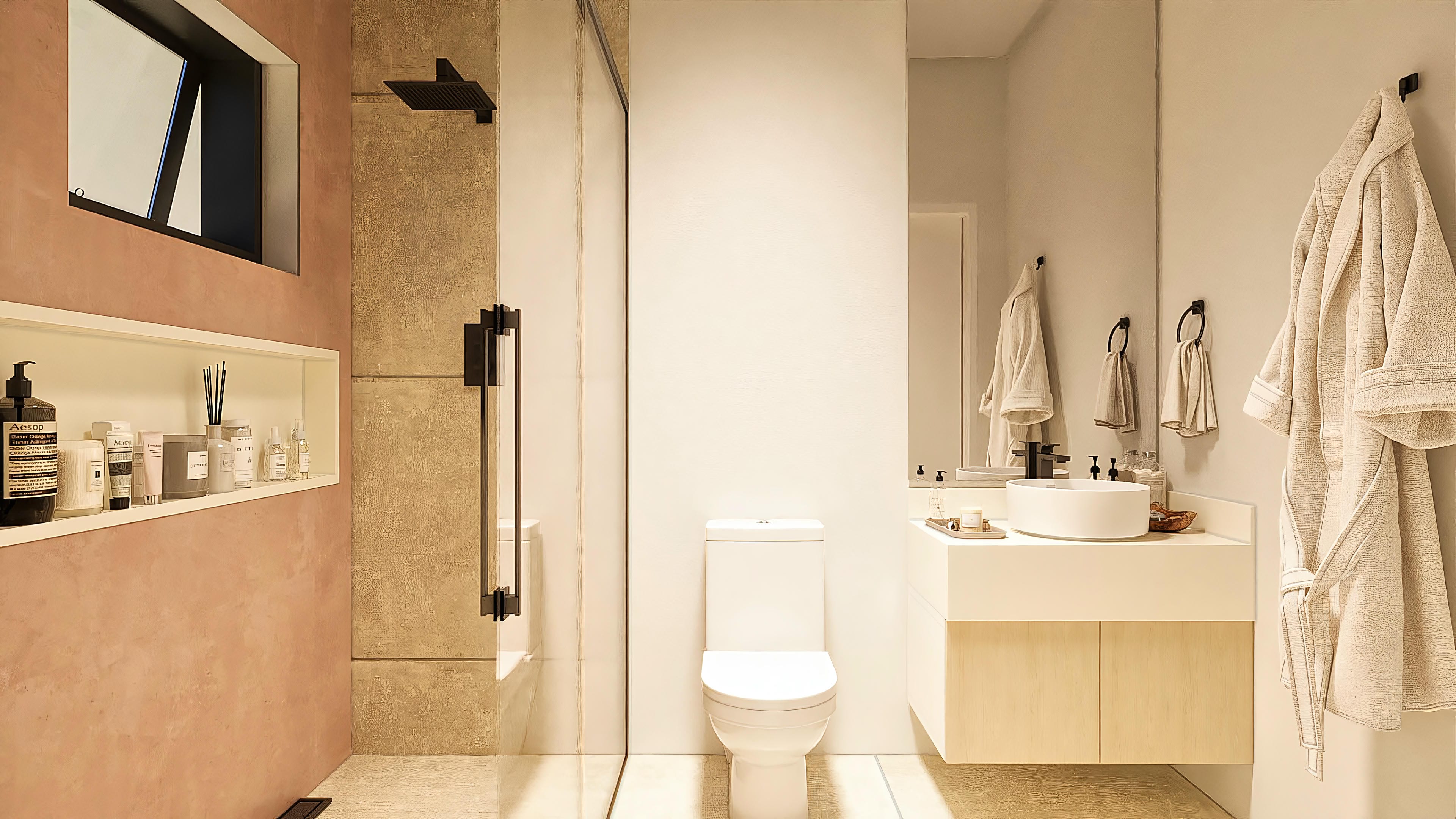 Details of a modern bathroom with sophisticated textures, illuminated niche, tempered glass shower stall, and light wood furniture.