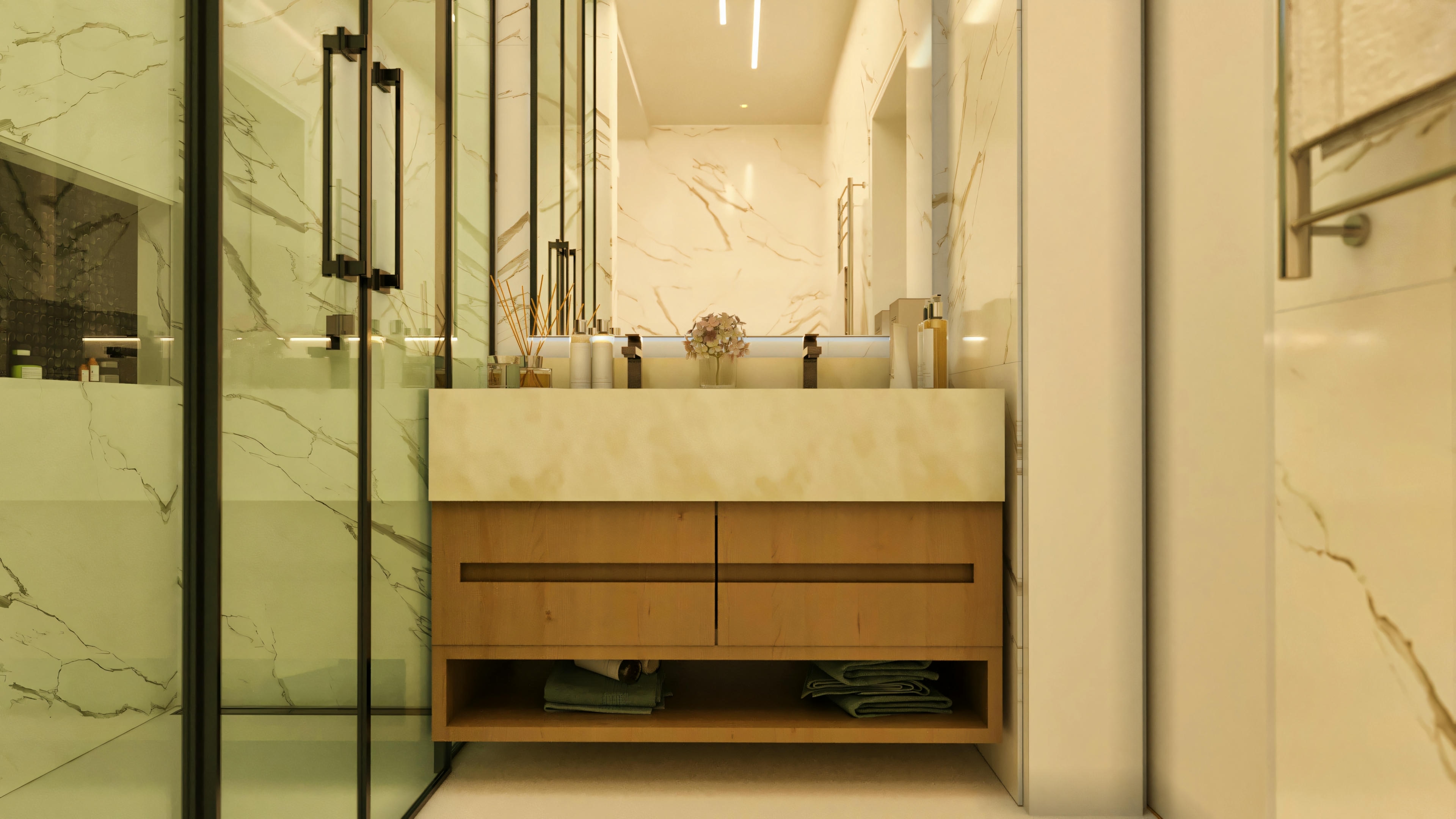 Detalle del baño de una de las 4 suites de un proyecto de casa con piscina y quincho. La imagen exhibe mesada doble de material claro sobre gabinete de madera, revestimiento marmolado y box con perfilería negra, en un modelo de casa de 394.84m² en terreno 20x25.