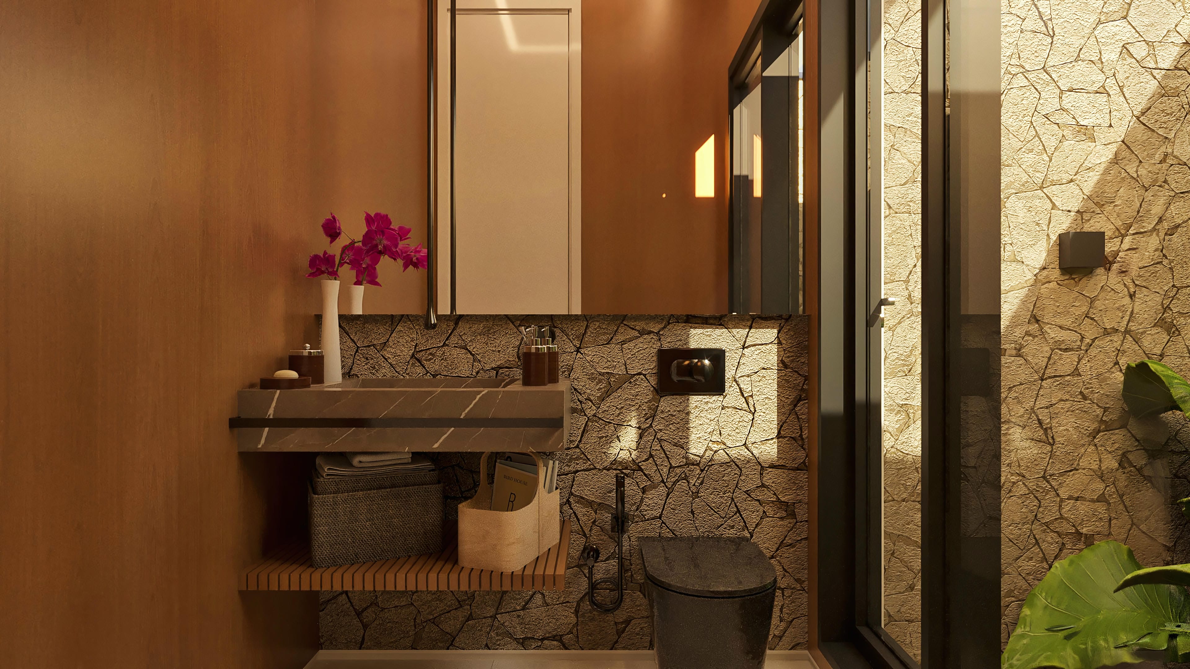 Detalles de un baño lujoso con revestimiento de piedra natural texturizada, encimera de mármol y panel con acabado en madera. Diseño moderno y elegante.