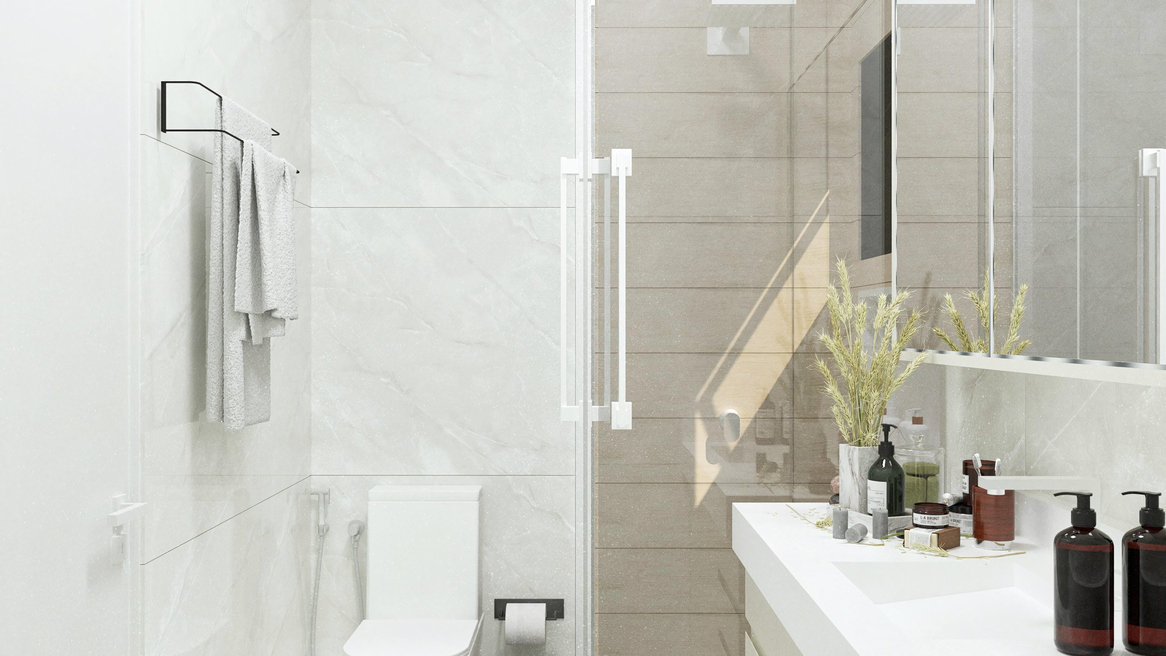 Bathroom with light and textured cladding, tempered glass shower enclosure, and minimalist accessories. Natural lighting highlights the details.