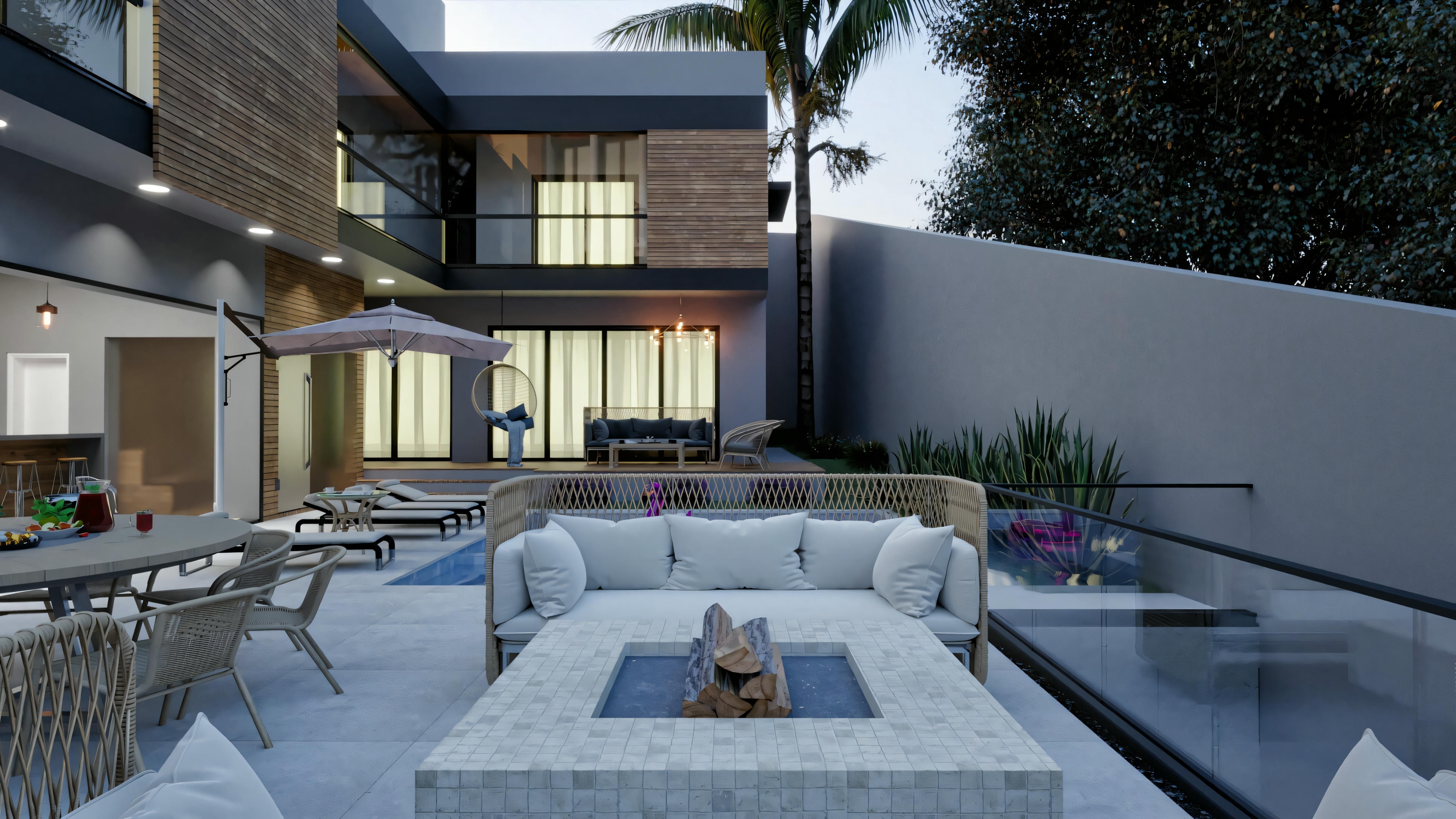 Amplia área de ocio de casa de planta baja moderna con 4 suites, piscina con vidrio, hoguera, sofás y área de comedor exterior, integrada a la fachada con detalles en madera.