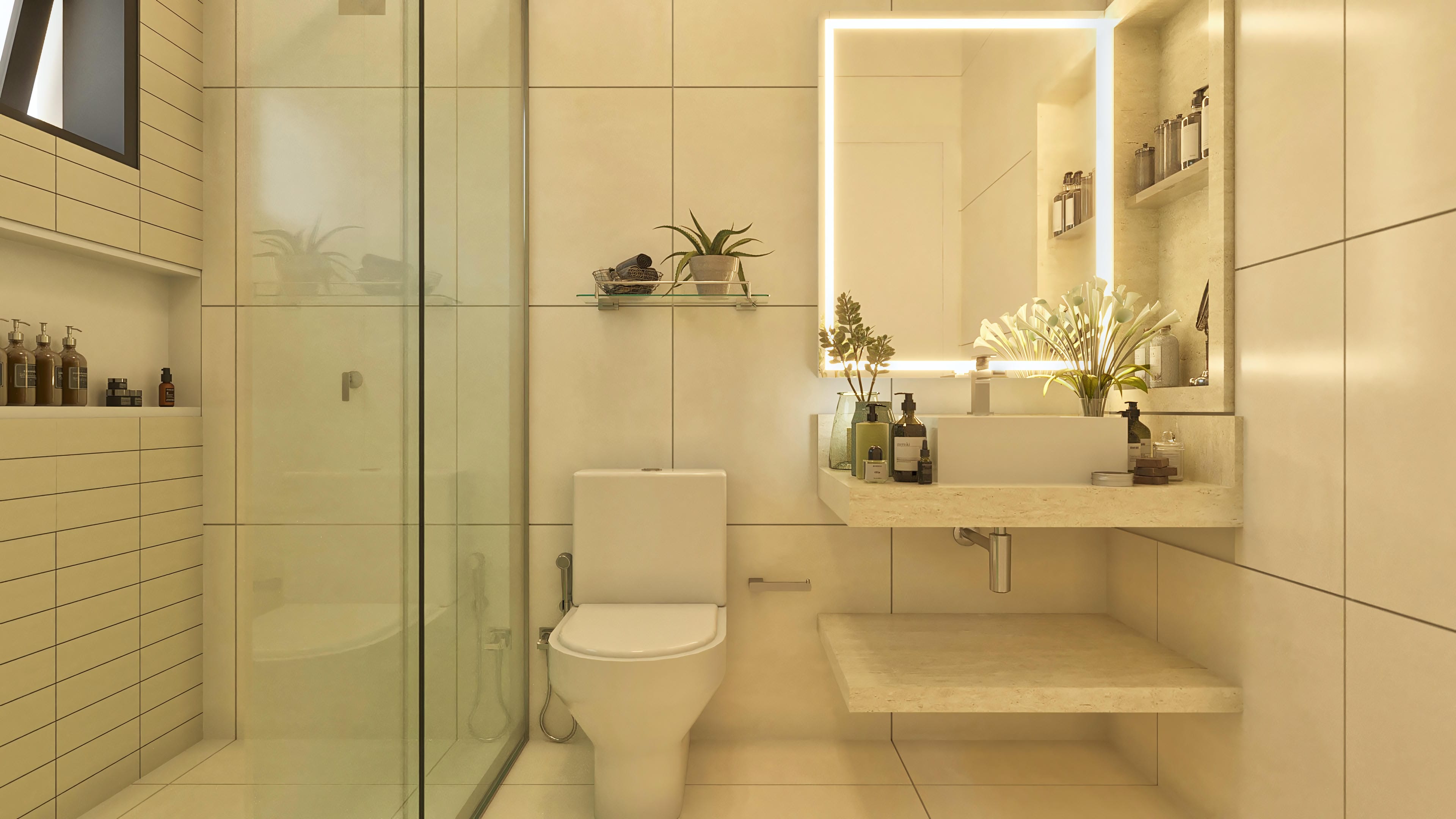 Detalle de un baño moderno con revestimiento en porcelanato de grandes formatos en tono beige, zona de ducha con vidrio templado y encimera suspendida en piedra clara.