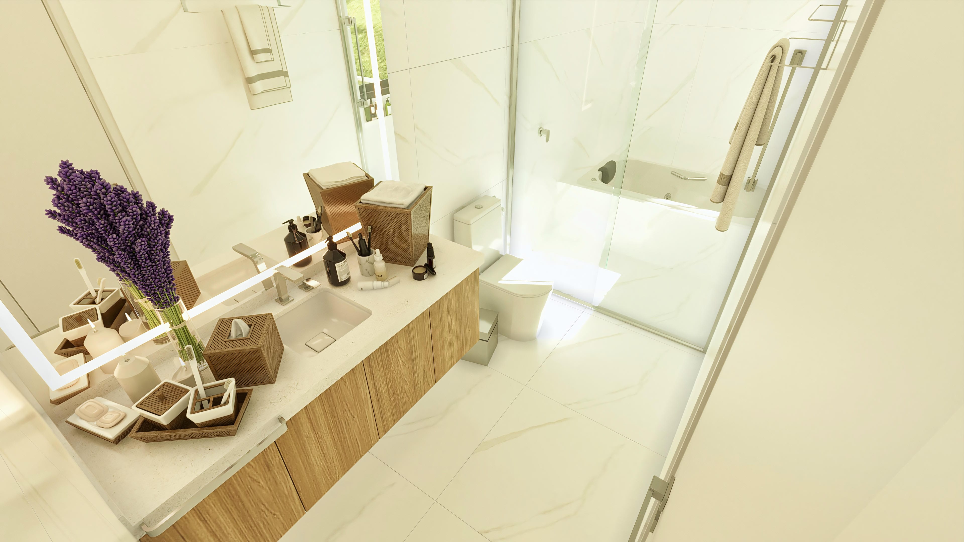 Detail of a bathroom with a light stone counter, carved sink, natural wood cabinet, and mirror with LED lighting. The shower area with shower and built-in bathtub is separated by tempered glass.