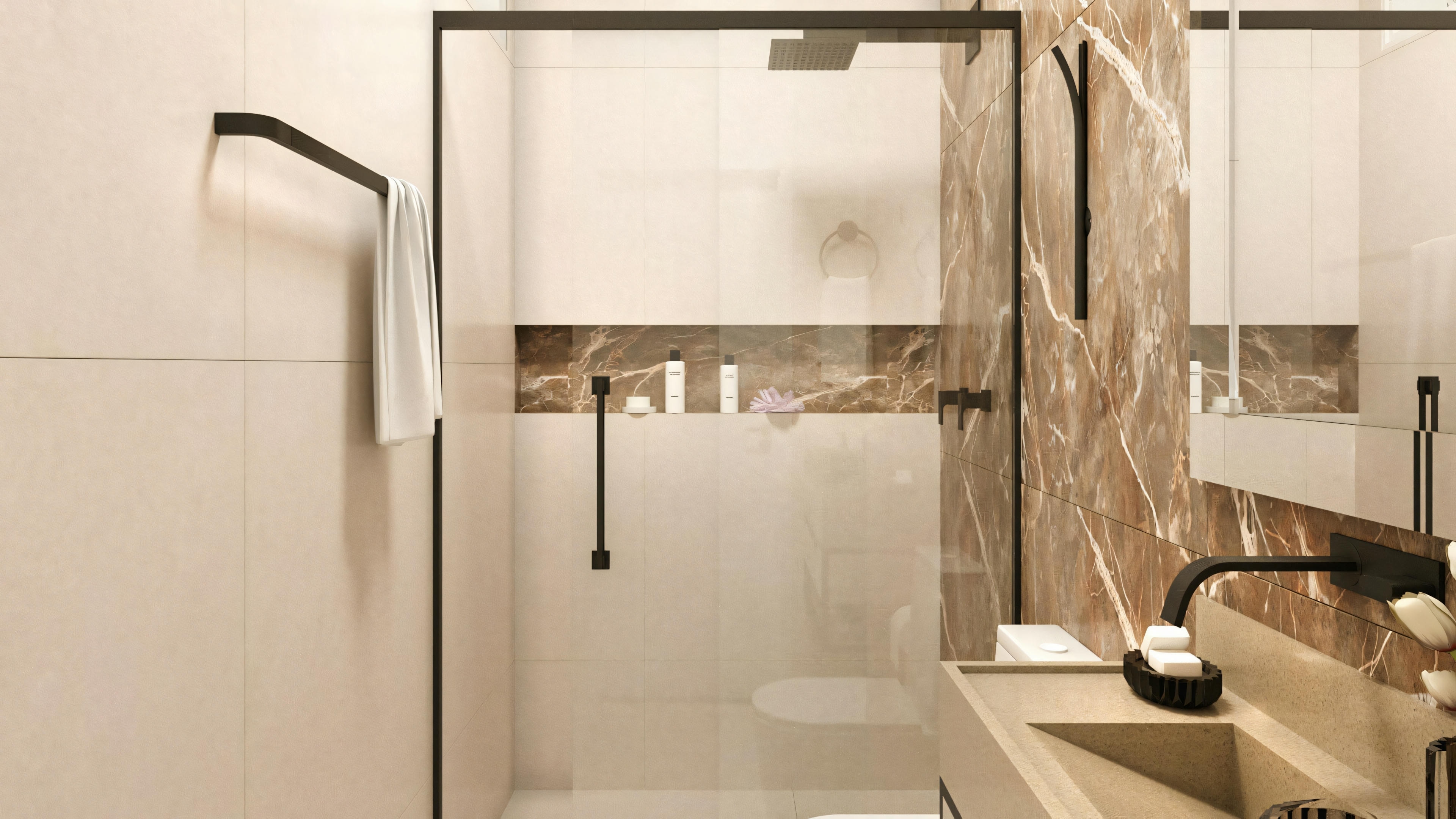 Un cuarto de baño moderno con zona de ducha visible detrás de una división de vidrio, con paredes de mármol y suelo blanco.