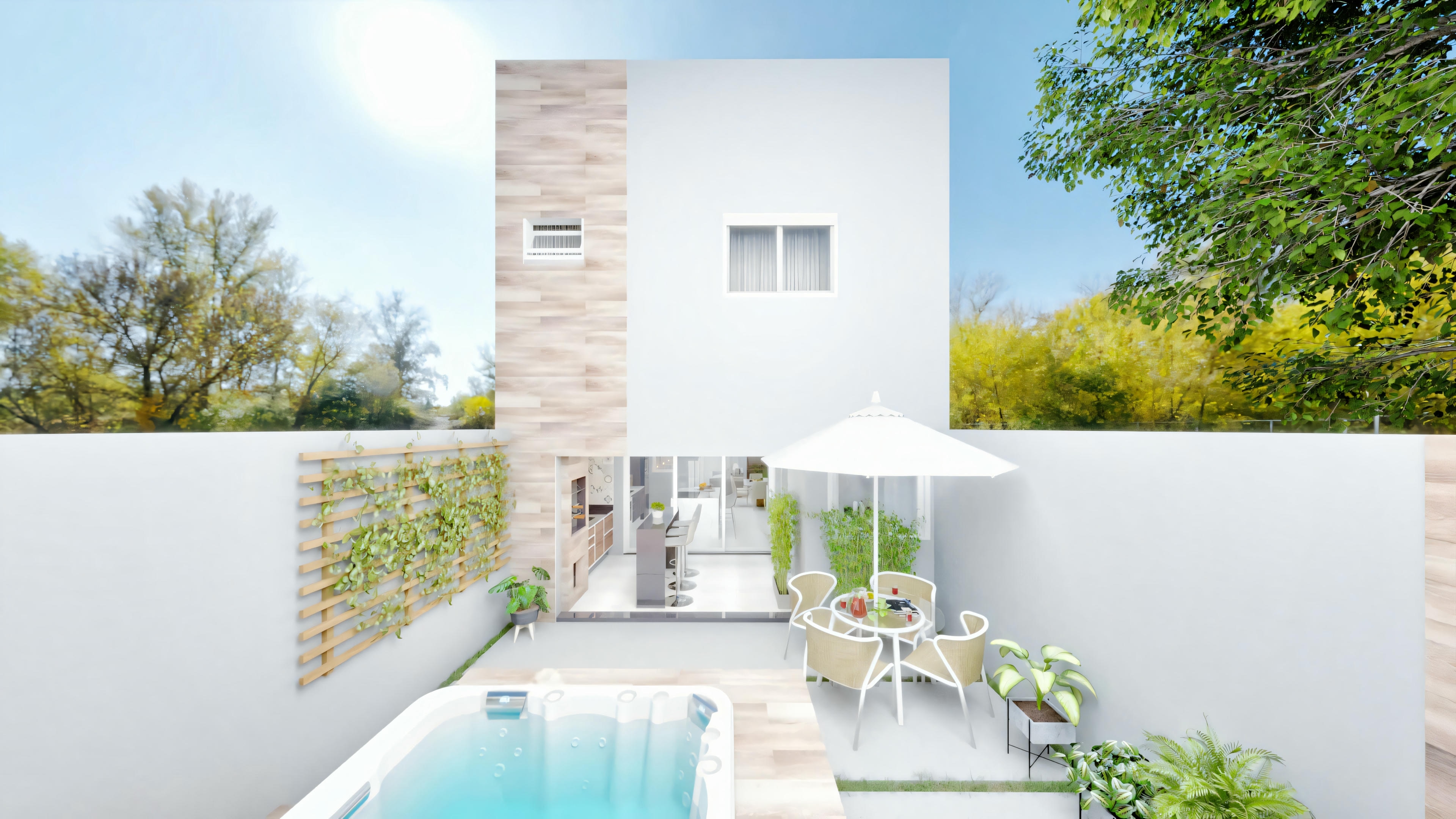 Elevated view of an outdoor space that includes the pool and seating area, with additional vegetation and the exterior of the building visible.