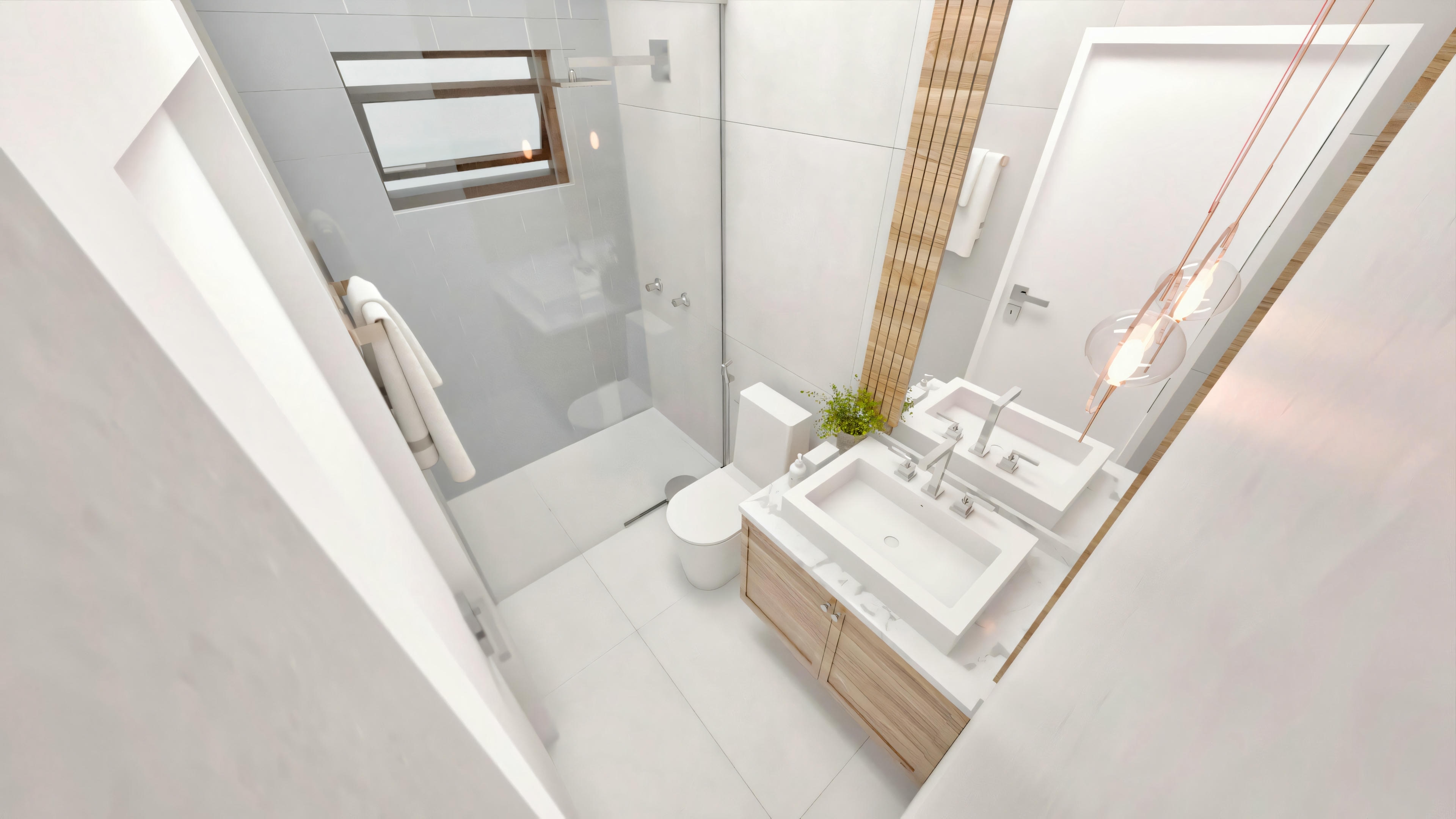 Overhead view of a white bathroom with a shower area, sink, and towel rack.