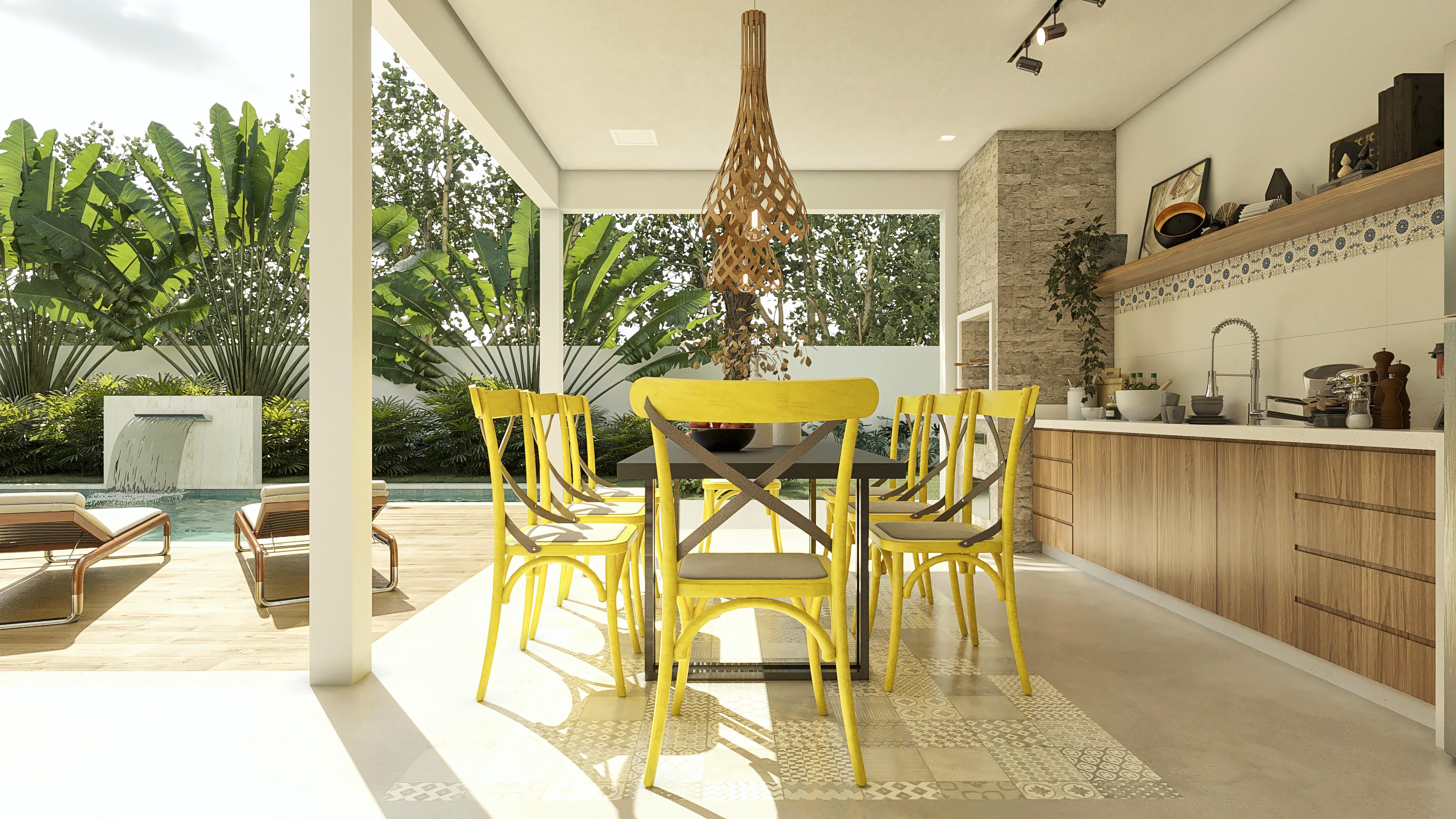 Área gourmet integrada a lazer com piscina, contendo mesa de jantar, cadeiras amarelas vibrantes e bancada com armários de madeira.