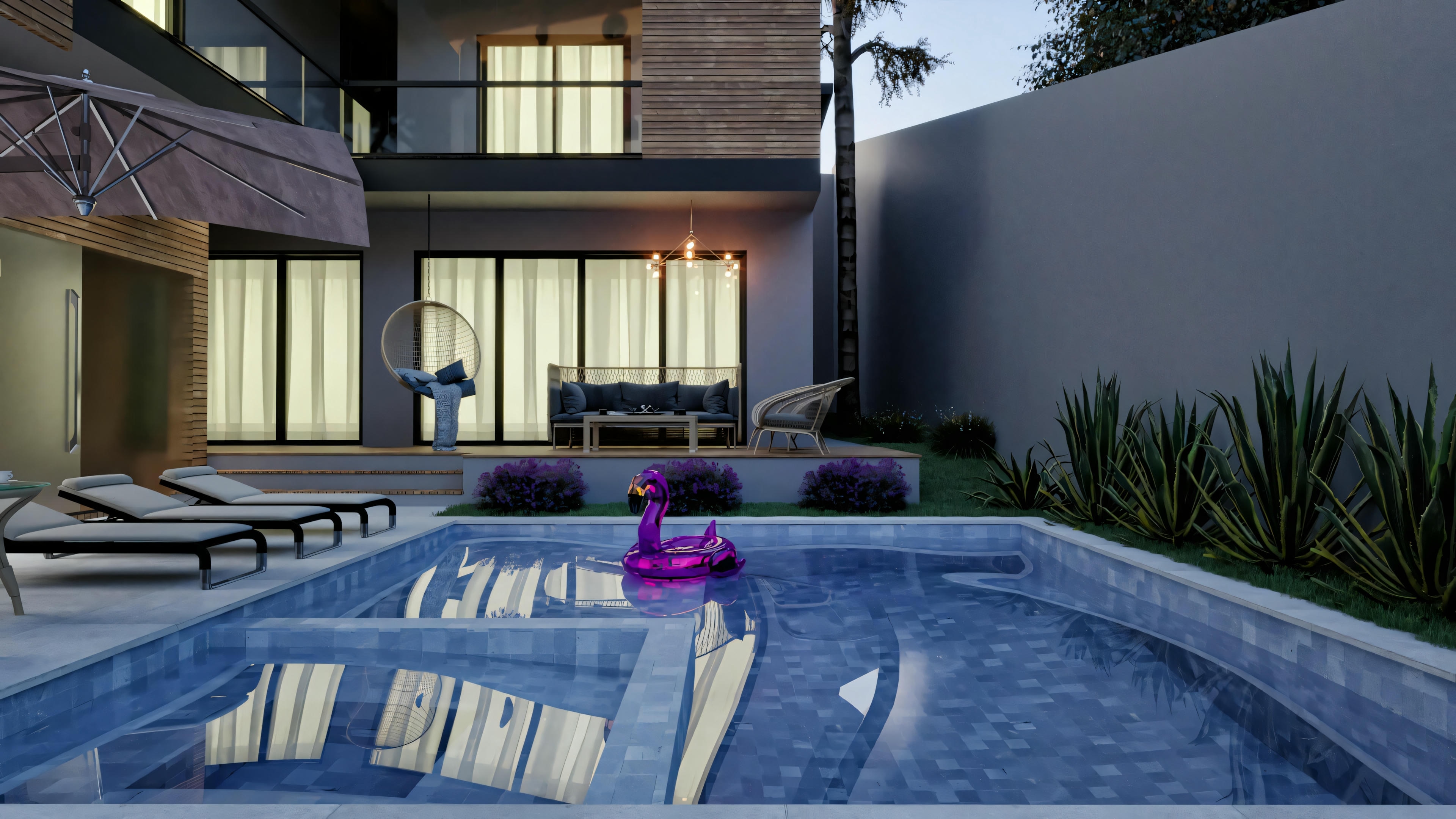 Night view of the leisure area with a blue tile-lined pool and underwater lighting, belonging to a modern 4-suite house of 316.98m², built on a 17x27 plot. In the background, a covered veranda and facade with wood and glass details.