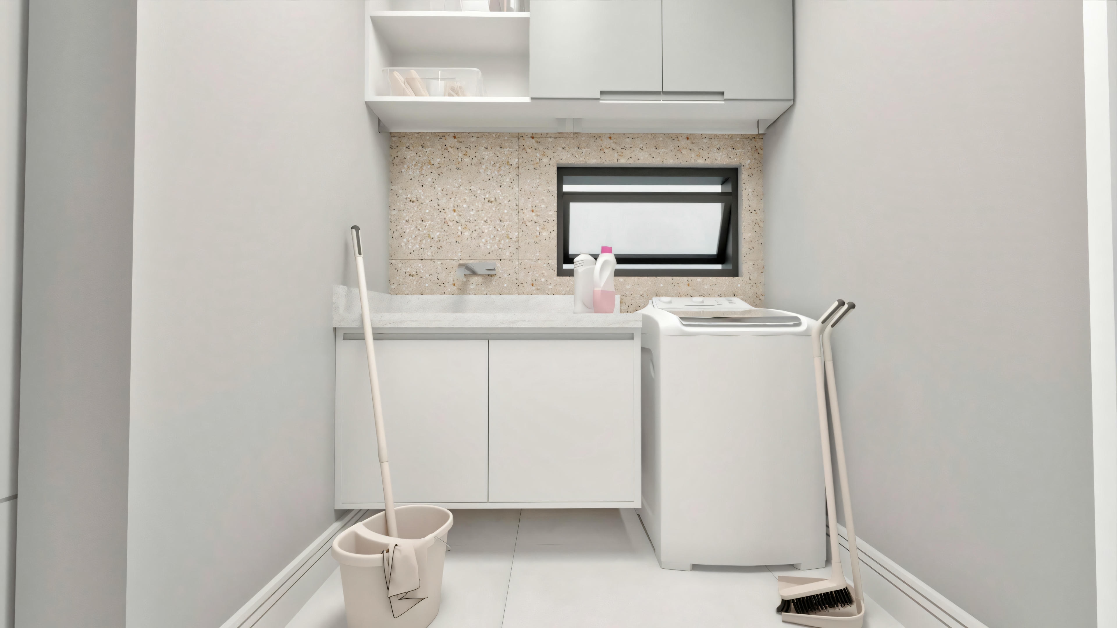 Modern laundry room with a washing machine, white wall cabinet, and sink with faucet.