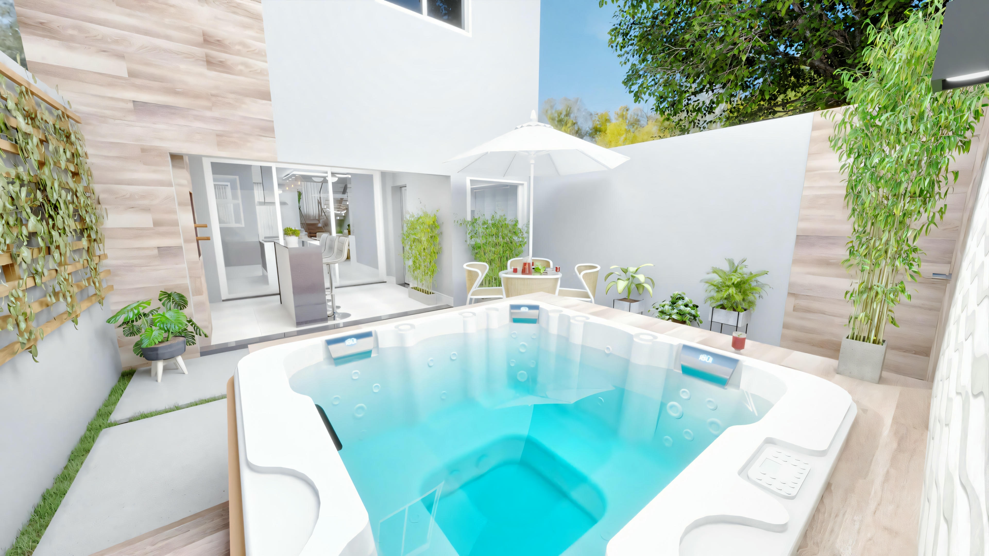 A small pool surrounded by white walls and green plants, creating a private and serene atmosphere.