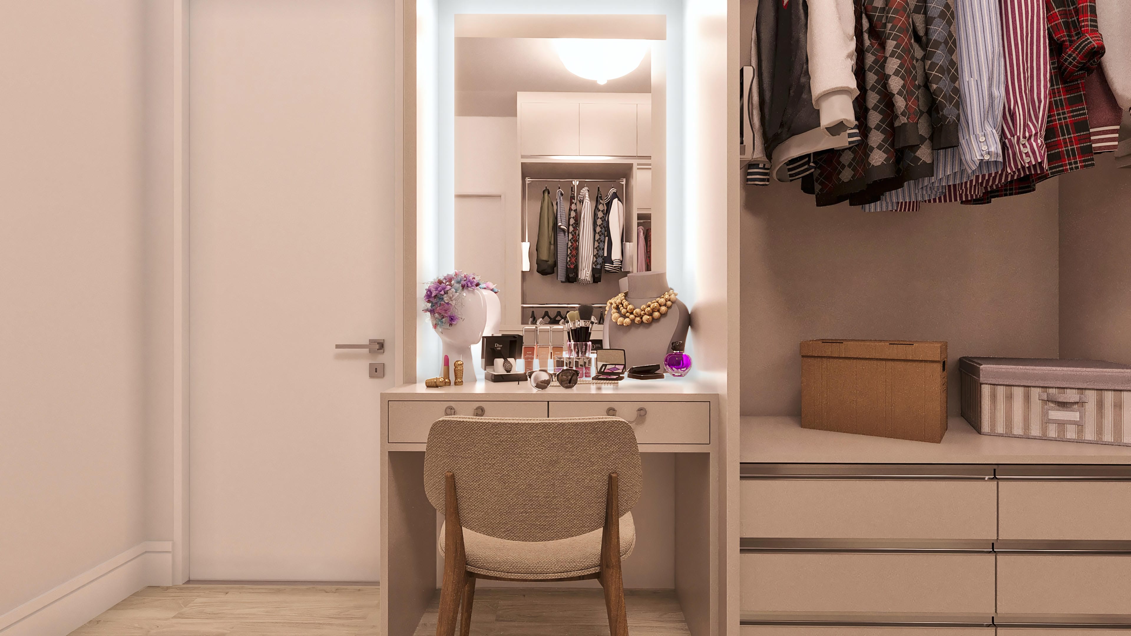 Interior de un vestidor moderno con tocador integrado, espejo retroiluminado y amplios armarios para organizar ropa y accesorios.