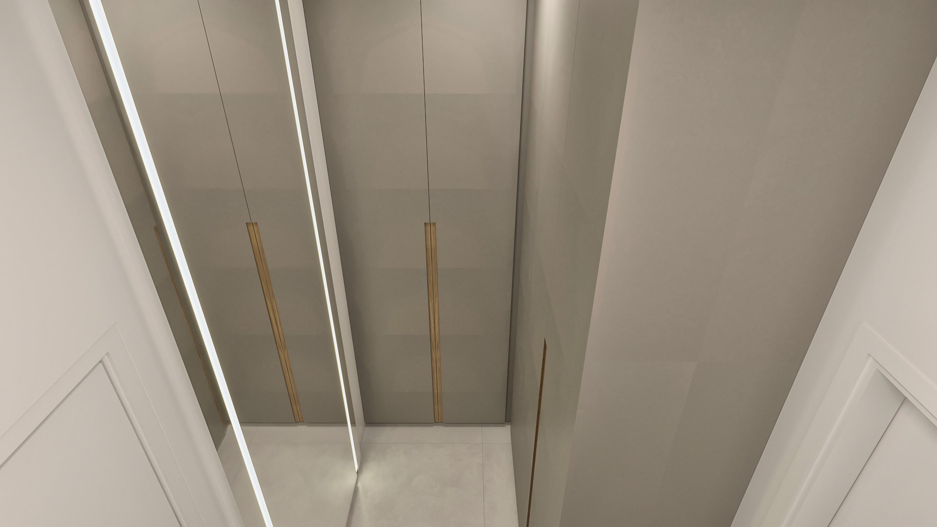 Linear recessed lighting in a ceiling with wood details, highlighting modern lines and sophisticated finishes in neutral tones. The clean and elegant design perfectly integrates into a contemporary environment.