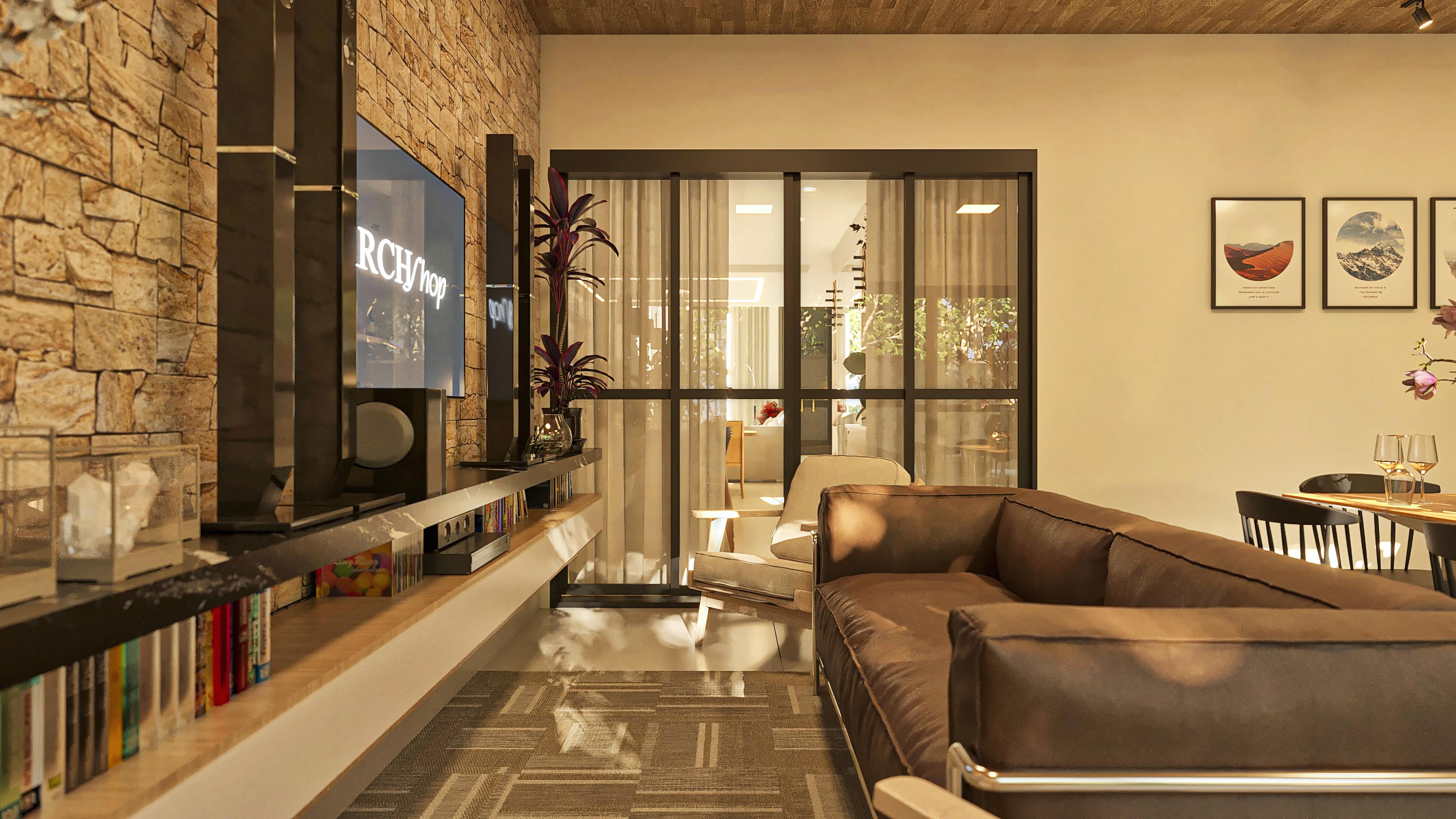 Ambiente interno con pared de piedras naturales, estantería empotrada con libros y objetos decorativos, sofá de cuero marrón y puerta corredera de vidrio que integra al exterior.