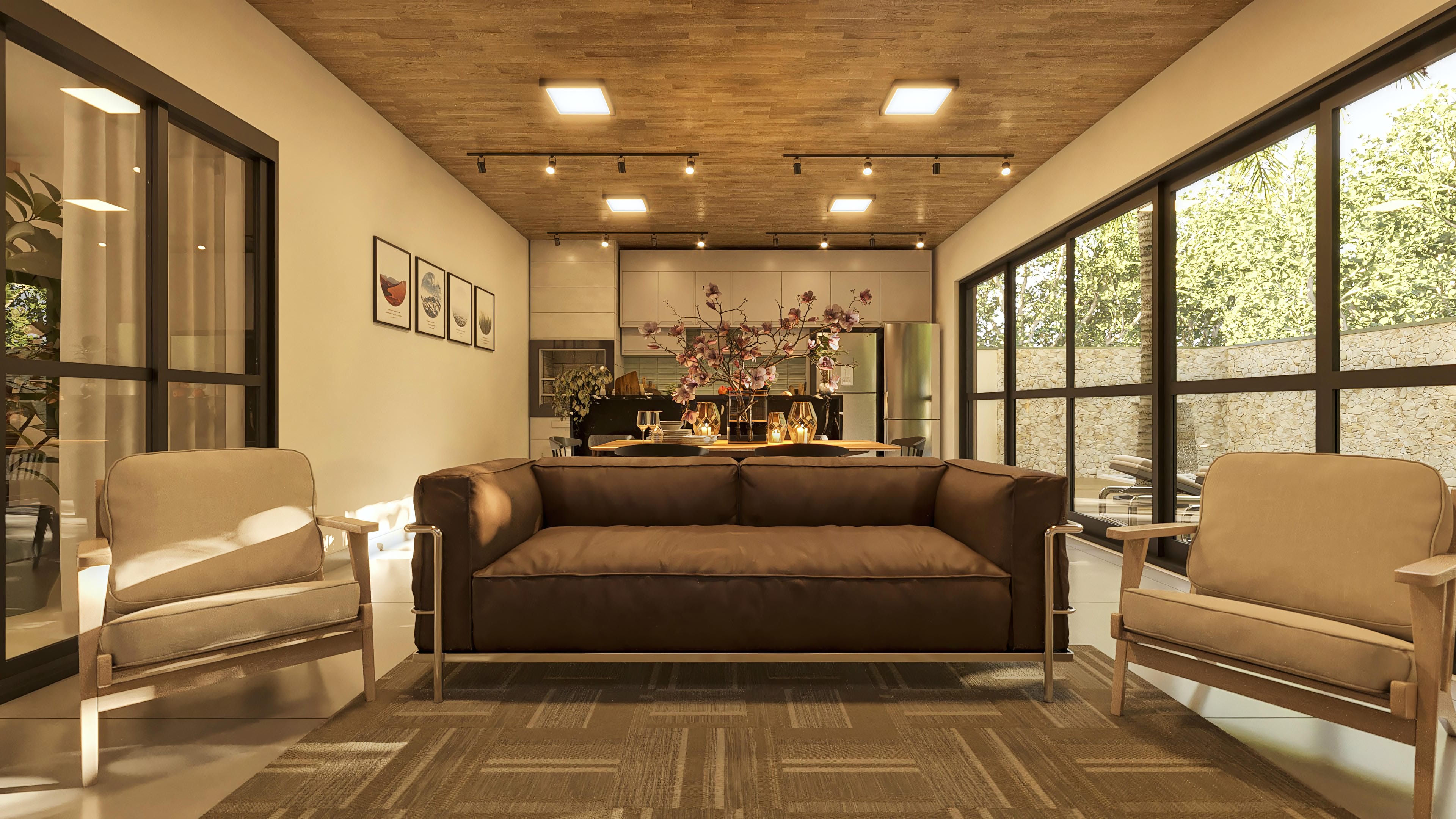 Two-story house interior with wide living room integrated with the kitchen, with a brown sofa, armchairs, and dining table, high ceiling with wooden lining and recessed lighting.