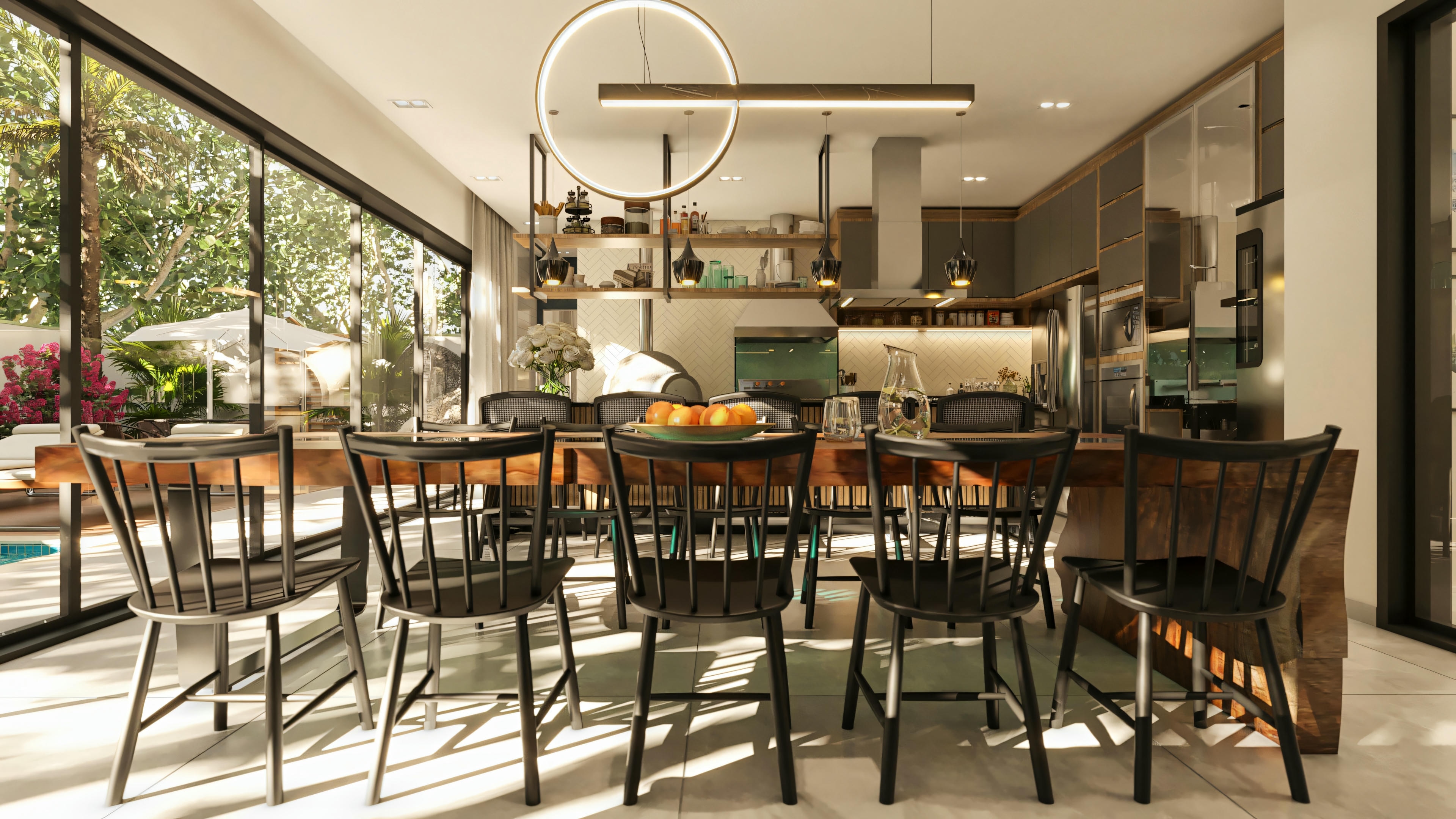 Amplia área gourmet y comedor integrados en casa de alto estándar con 5 suites, con mesa de comedor de madera para varios lugares, cocina moderna equipada al fondo y vista al área de la piscina a través de puertas de vidrio.