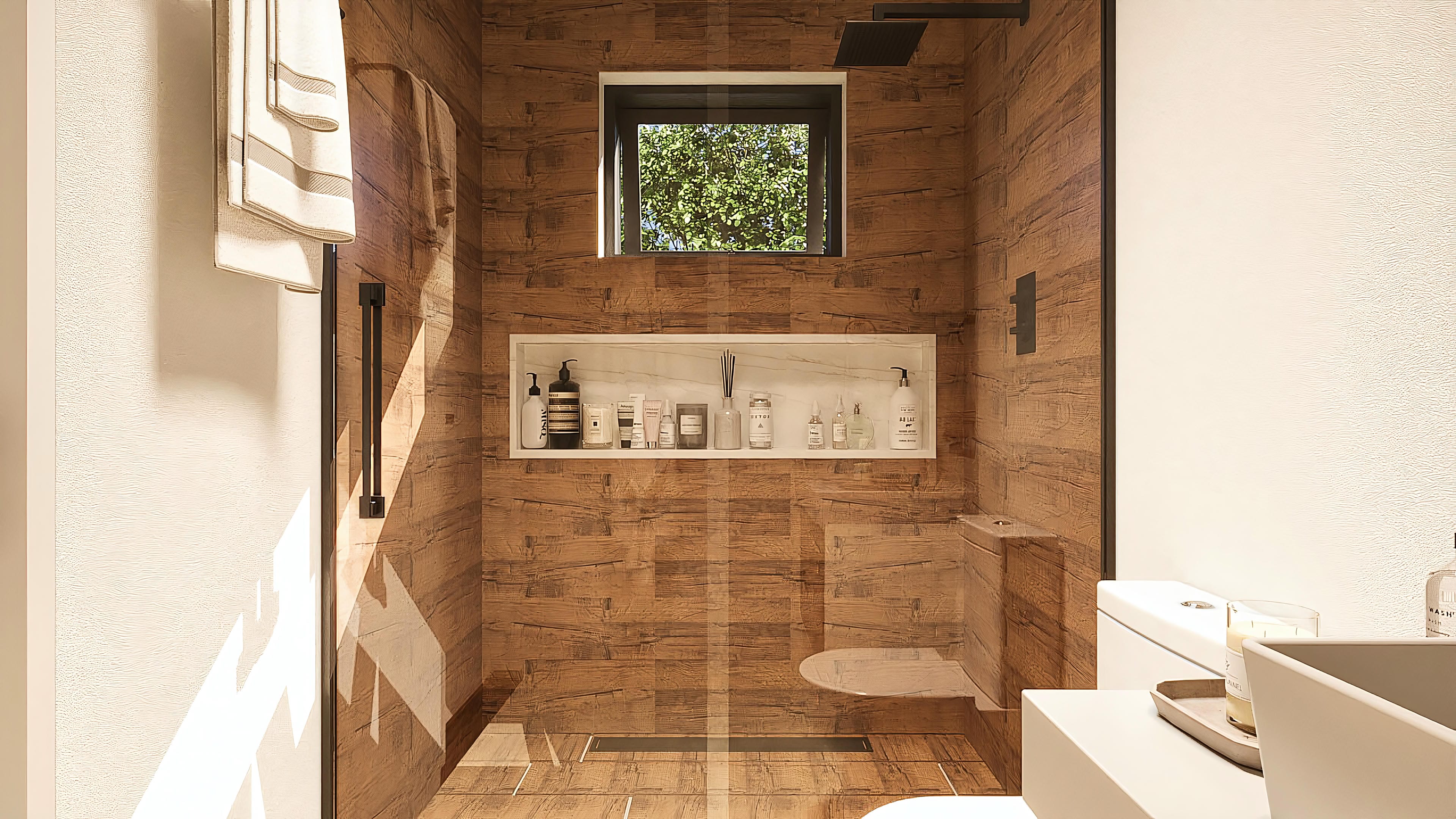 Detail of a bathroom with rustic wood cladding on the walls, niche with hygiene products, and a modern toilet. A framed window allows views of outside foliage.