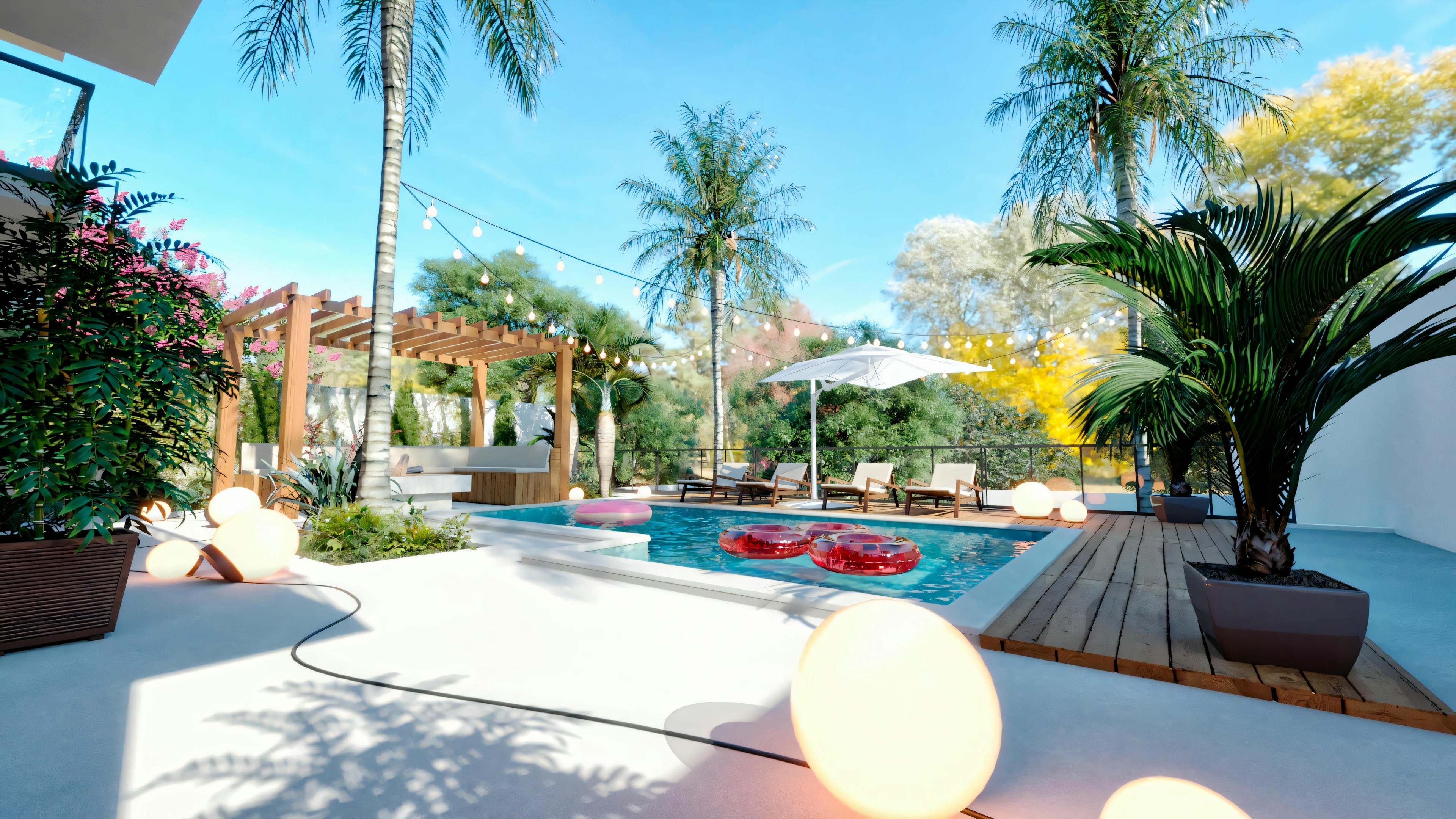 Zona de piscina exterior rodeada por palmeras y vegetación, com flotadores rojos en el agua.