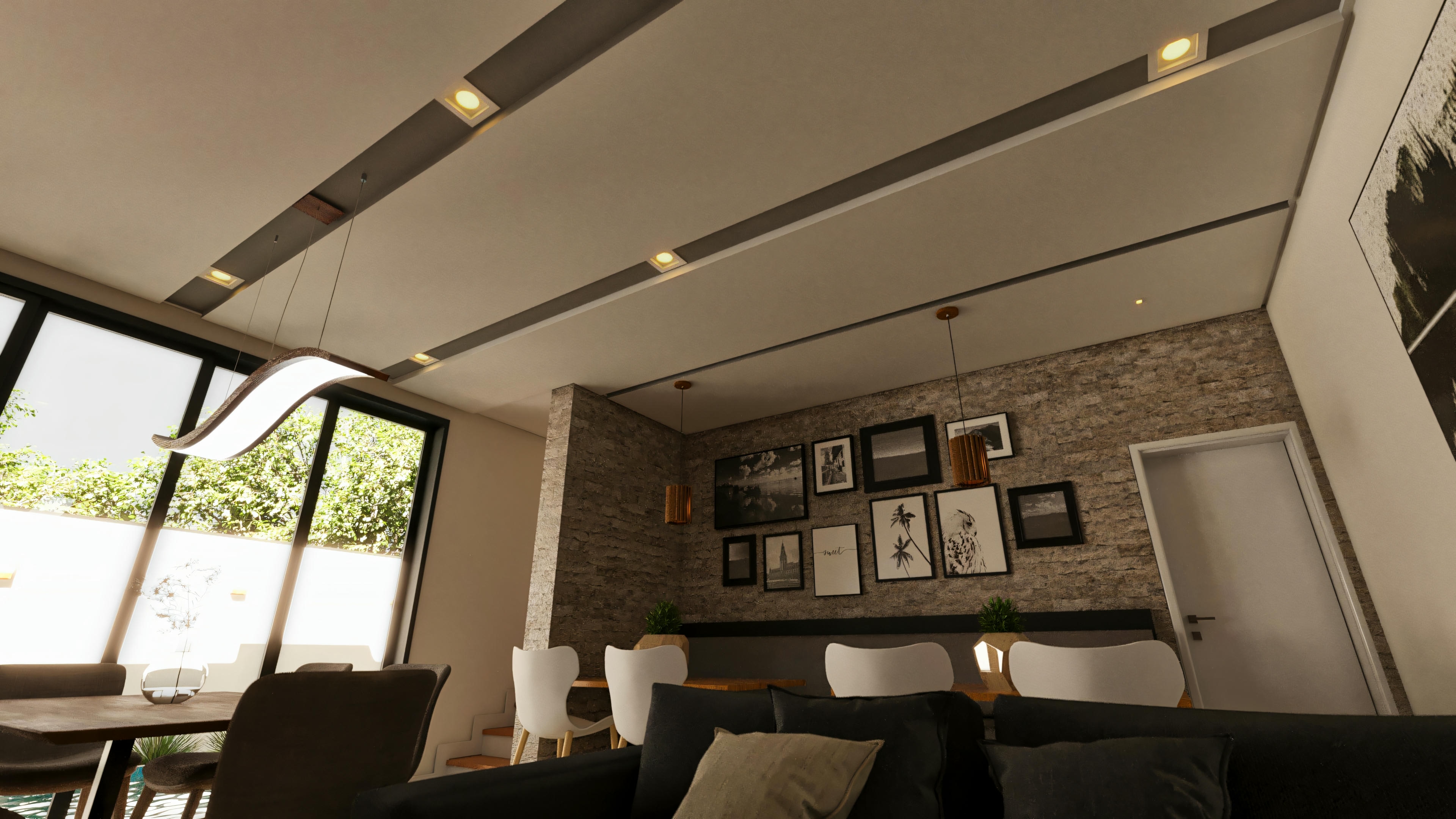 Overall view of the open-concept social area in the 4-suite pool house, showcasing the integration between the living/TV room, rustic wood dining table, and the gourmet kitchen/area in the background.
