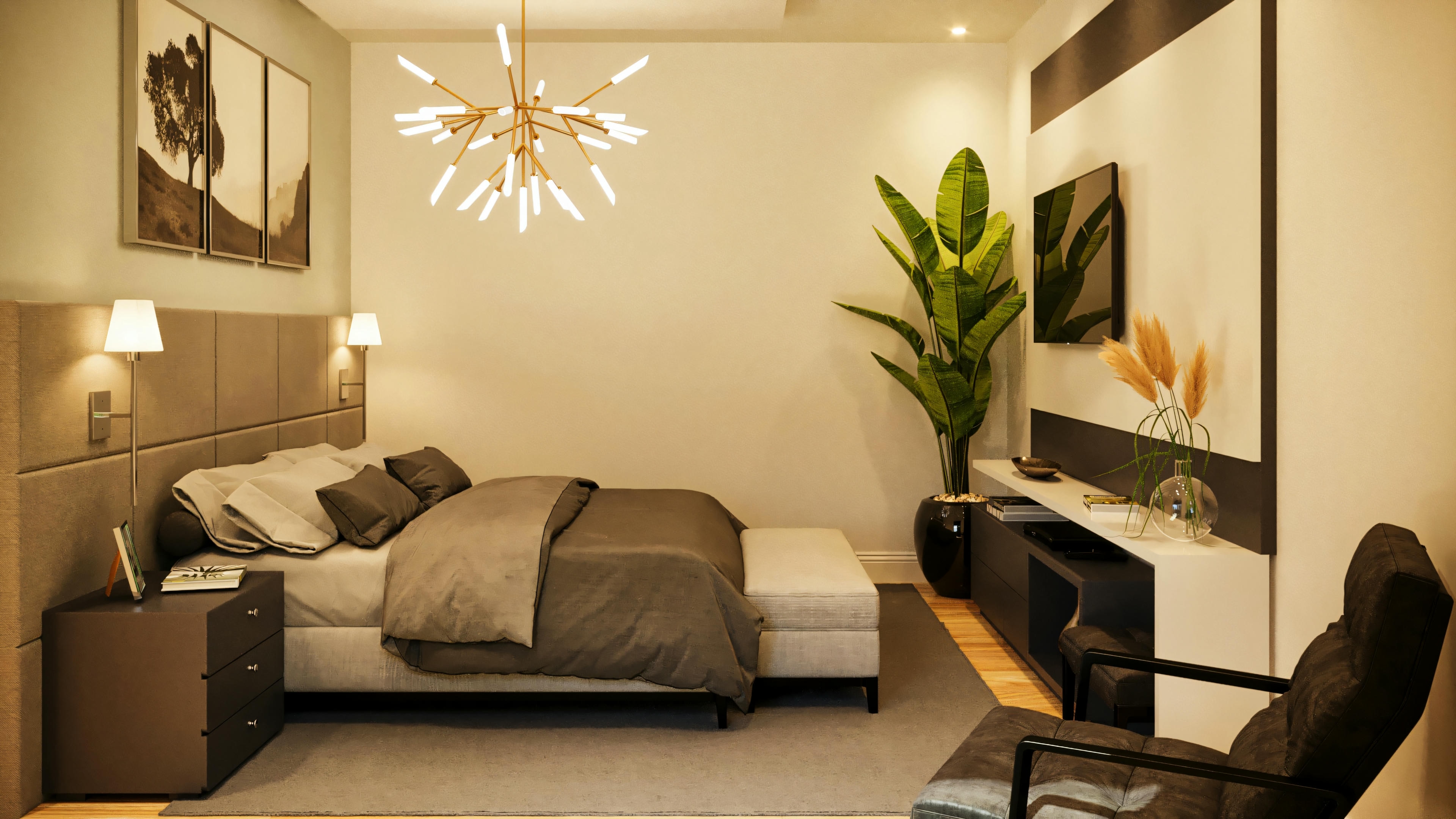 Amplia suite principal en casa de planta baja con 3 suites, exhibiendo cama de matrimonio con cabecero tapizado, mesitas de noche, iluminación con arandelas y lámpara colgante moderna, panel de TV y butaca.