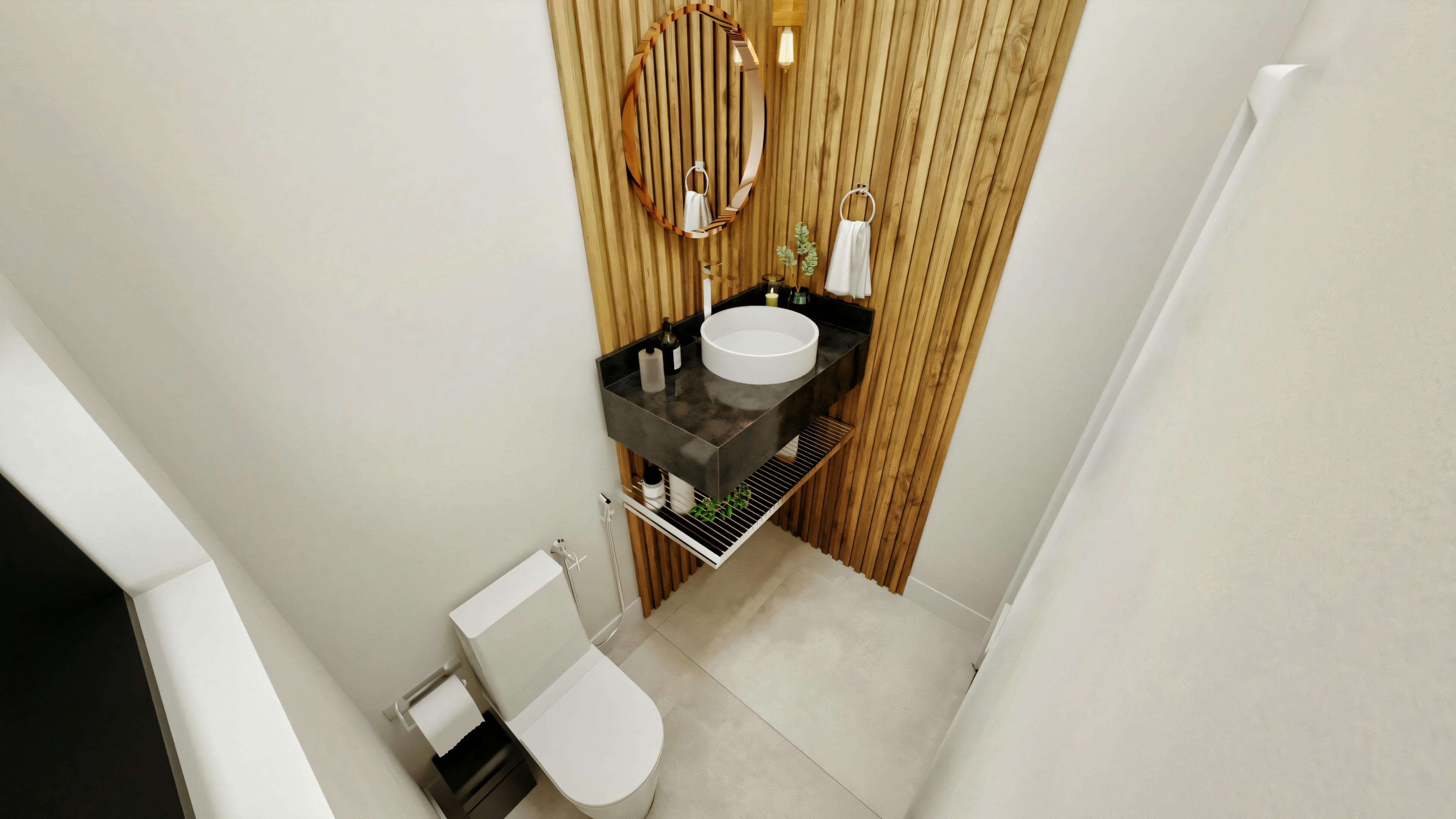 Angular view of the modern powder room with a feature wall of slatted wood panel, dark suspended countertop with white overlay sink, round mirror, and toilet. Interior design project of a 4-suite house with 316.98m².