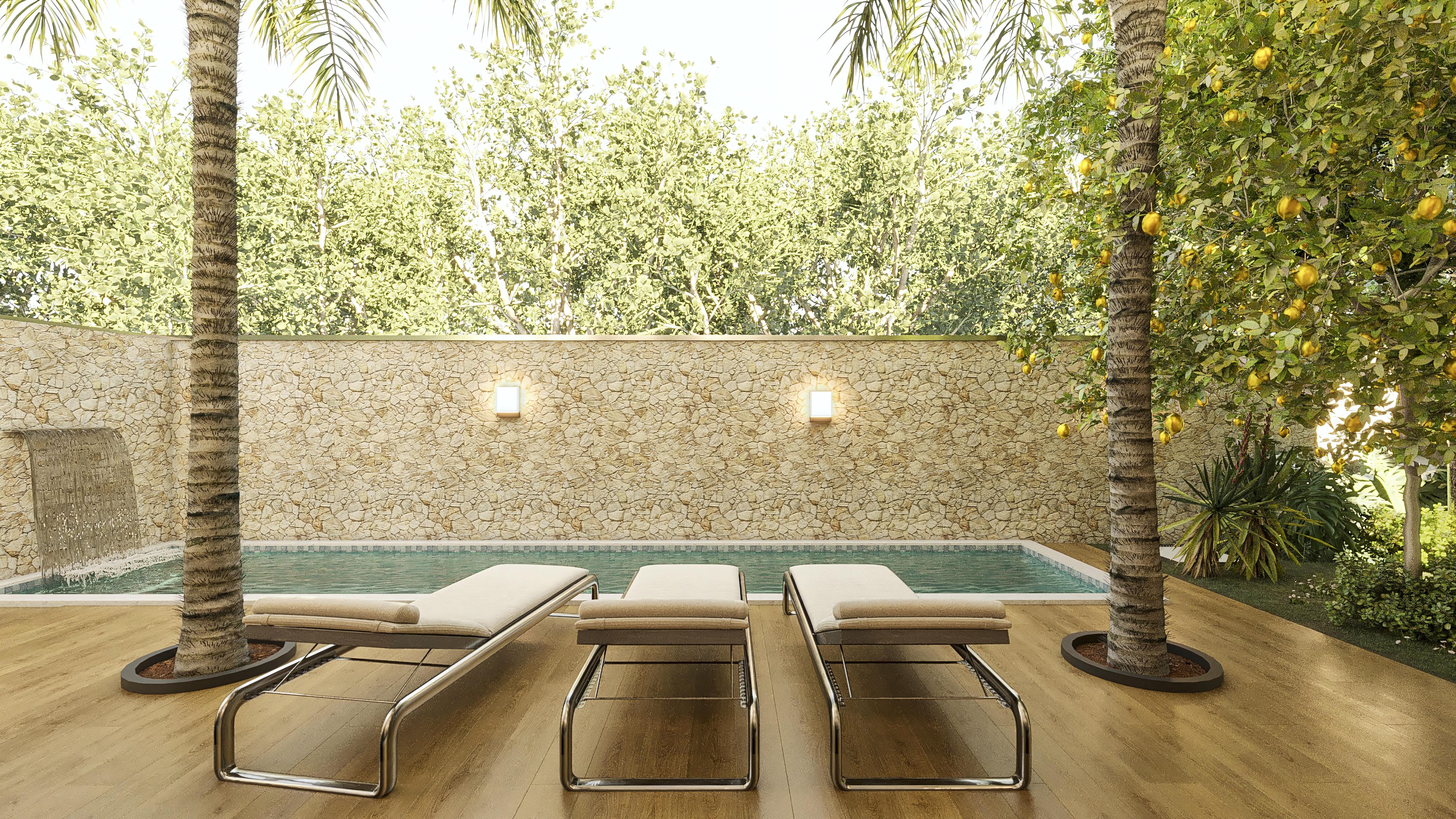 Área gourmet con plataforma de madera, piscina y cascada, rodeada por vegetación exuberante e iluminación sutil.