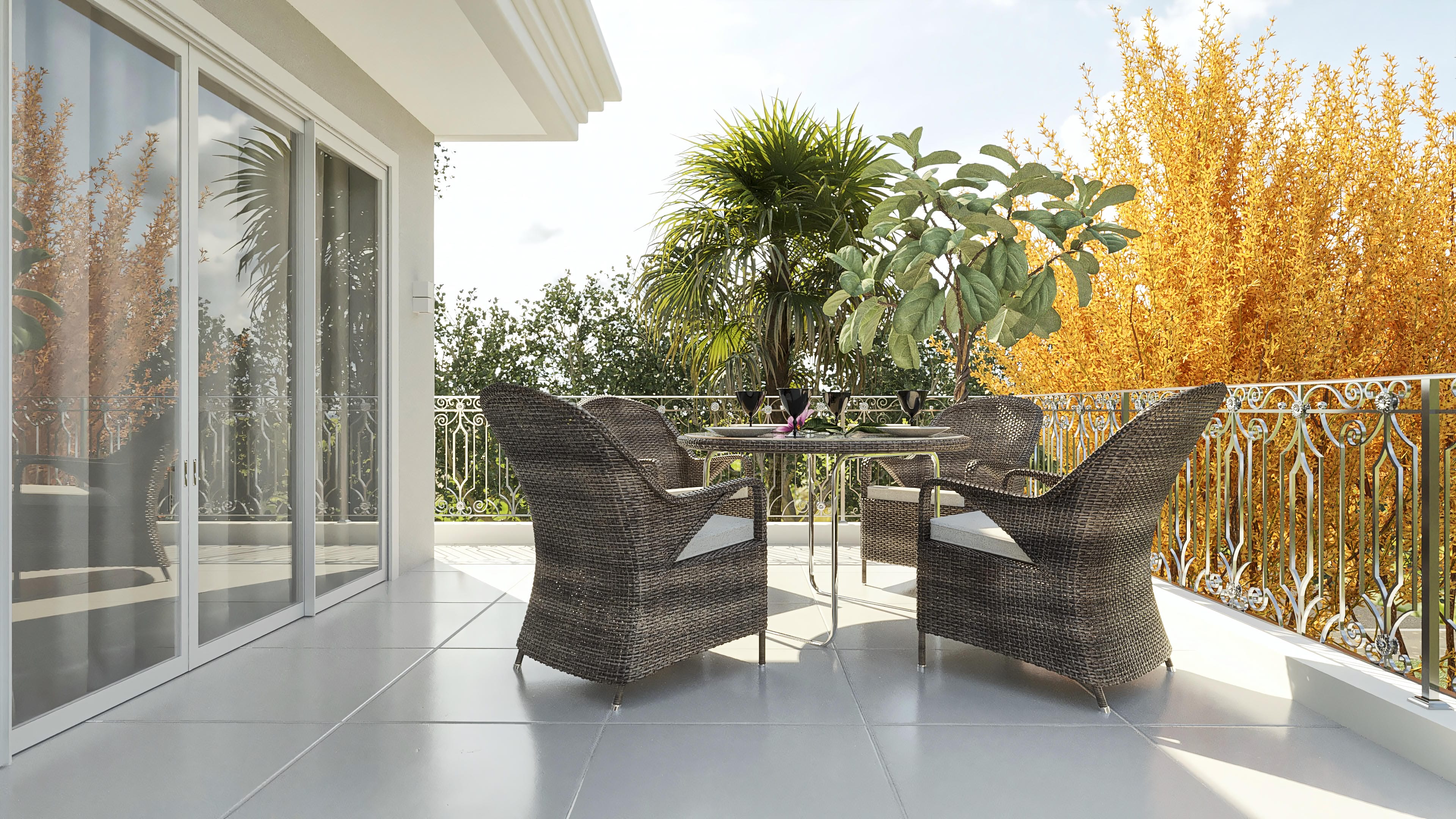 Gourmet balcony of a neoclassical two-story house with a view of lush landscaping, elegant furniture, and high-standard finishes.
