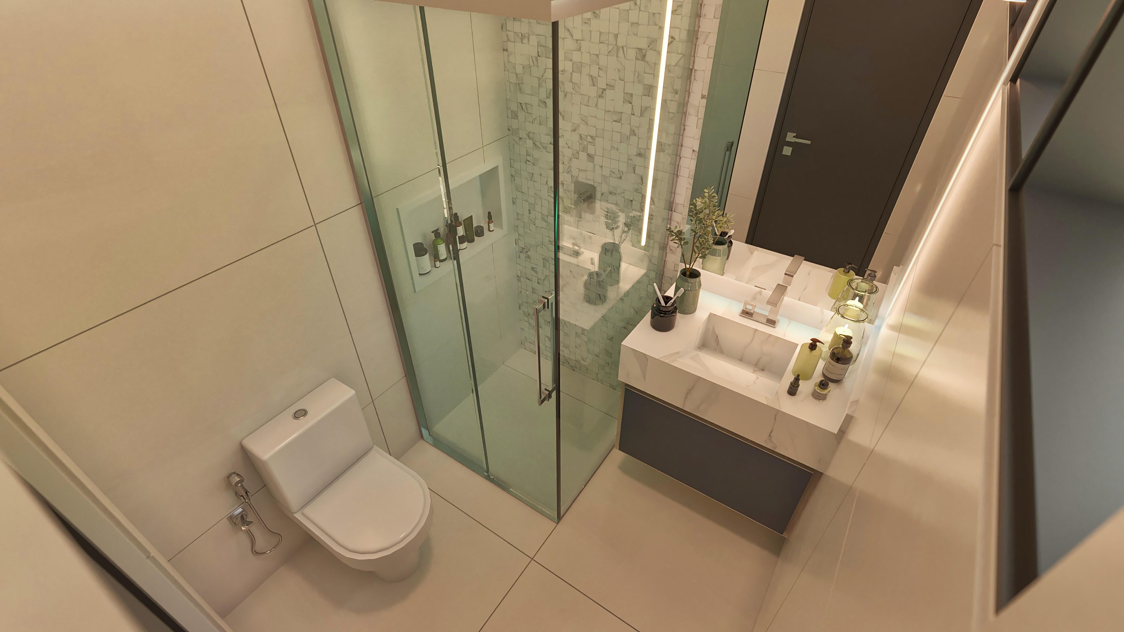 Detalle de baño moderno con cabina de vidrio, ducha con azulejos texturizados y encimera con lavabo esculpido en mármol.