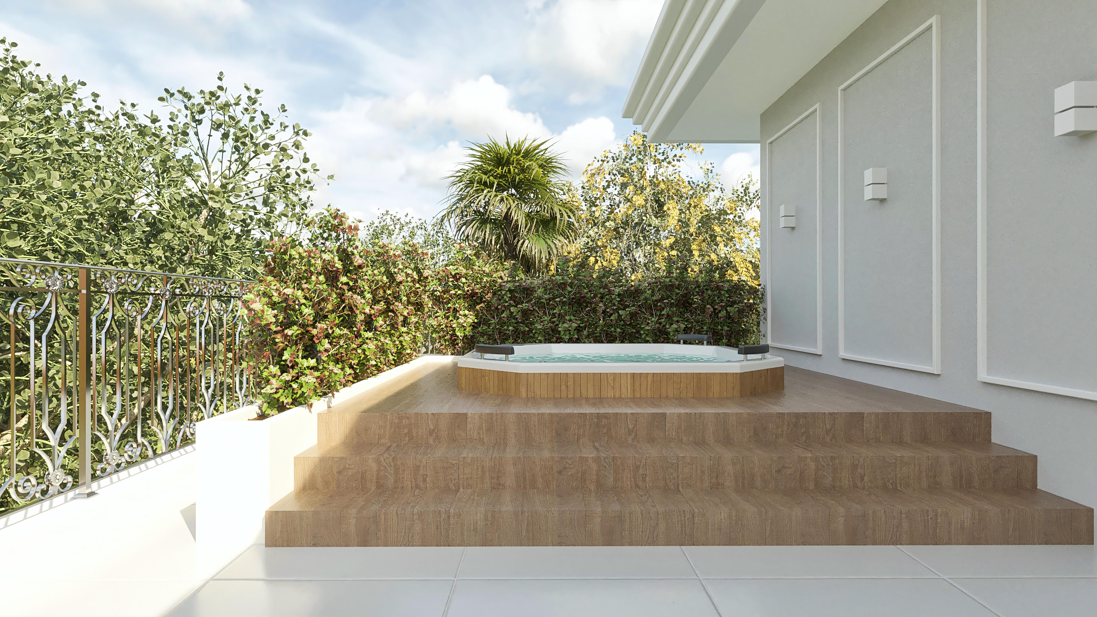 Detalhe de área externa com spa e deck de madeira, cercada por paisagismo exuberante e detalhes neoclássicos na edificação.
