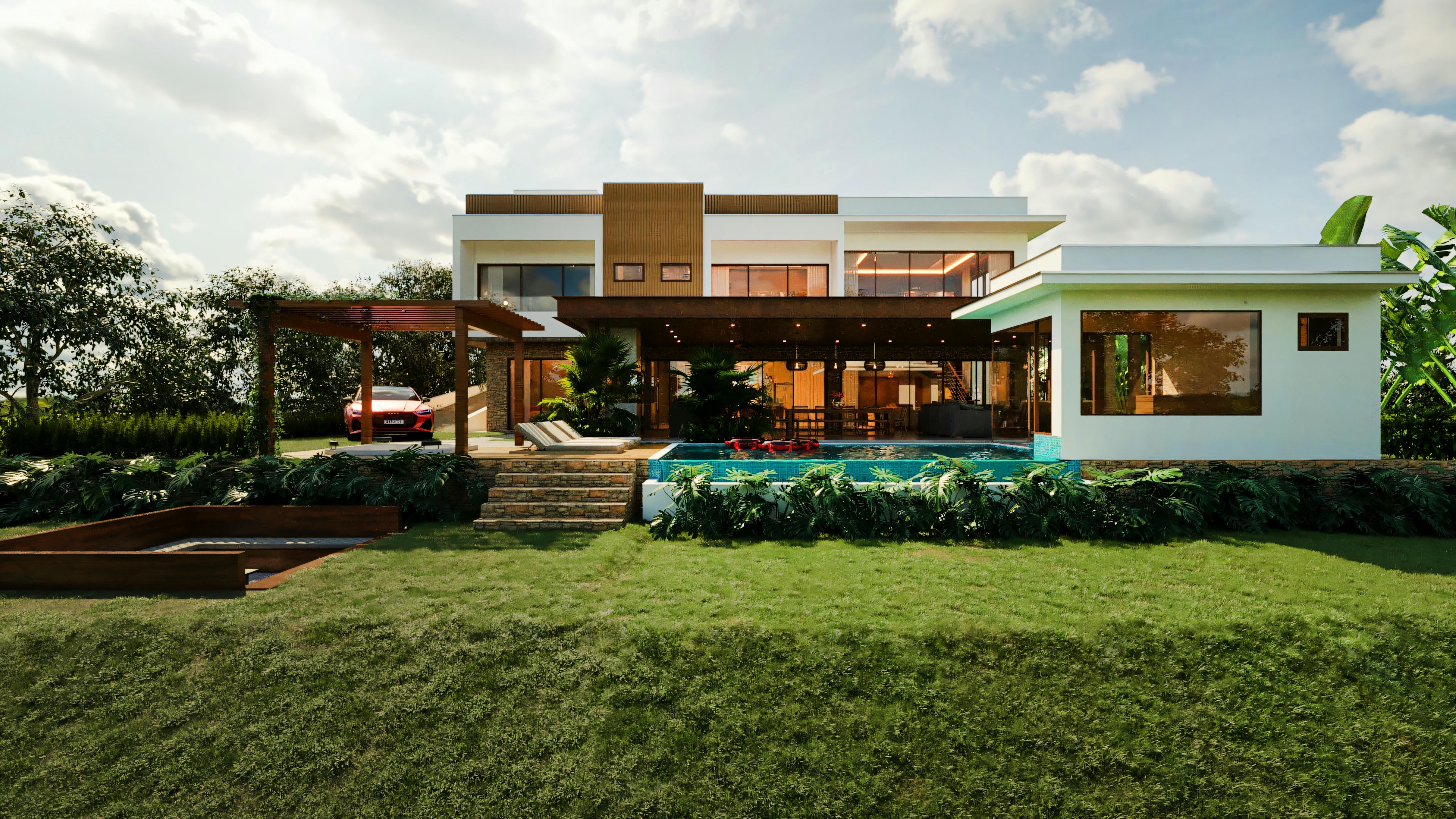 Vista geral da fachada posterior de uma casa de luxo moderna, exibindo a piscina, área gourmet coberta, fire pit no jardim, edícula de apoio envidraçada, pergolado e paisagismo.