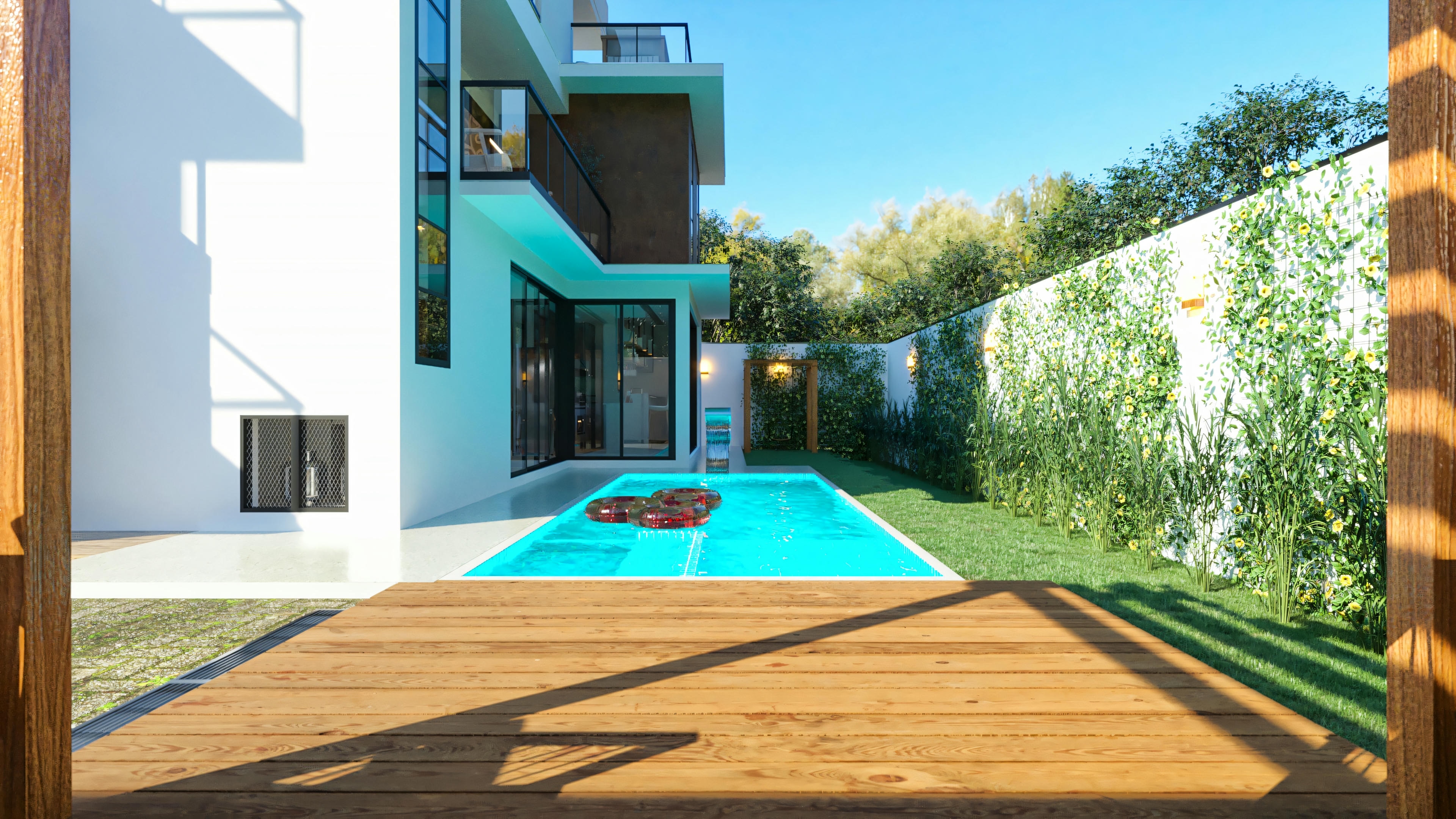 View from the wood deck towards the pool and the facade of the modern two-story house, with side garden and green wall. This 20x25 lot house project, with 394.84sqm, includes 4 suites, pool, gourmet area, and office.
