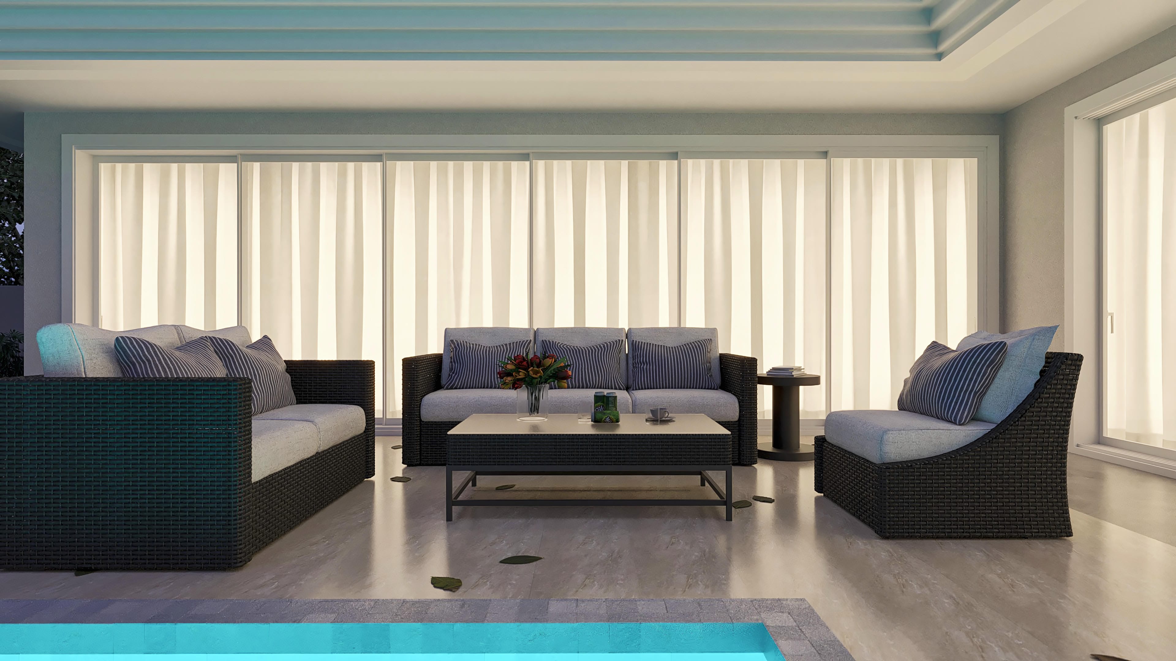 Área de lazer com sofás confortáveis, mesa de centro e piscina em projeto neoclássico de alto padrão.