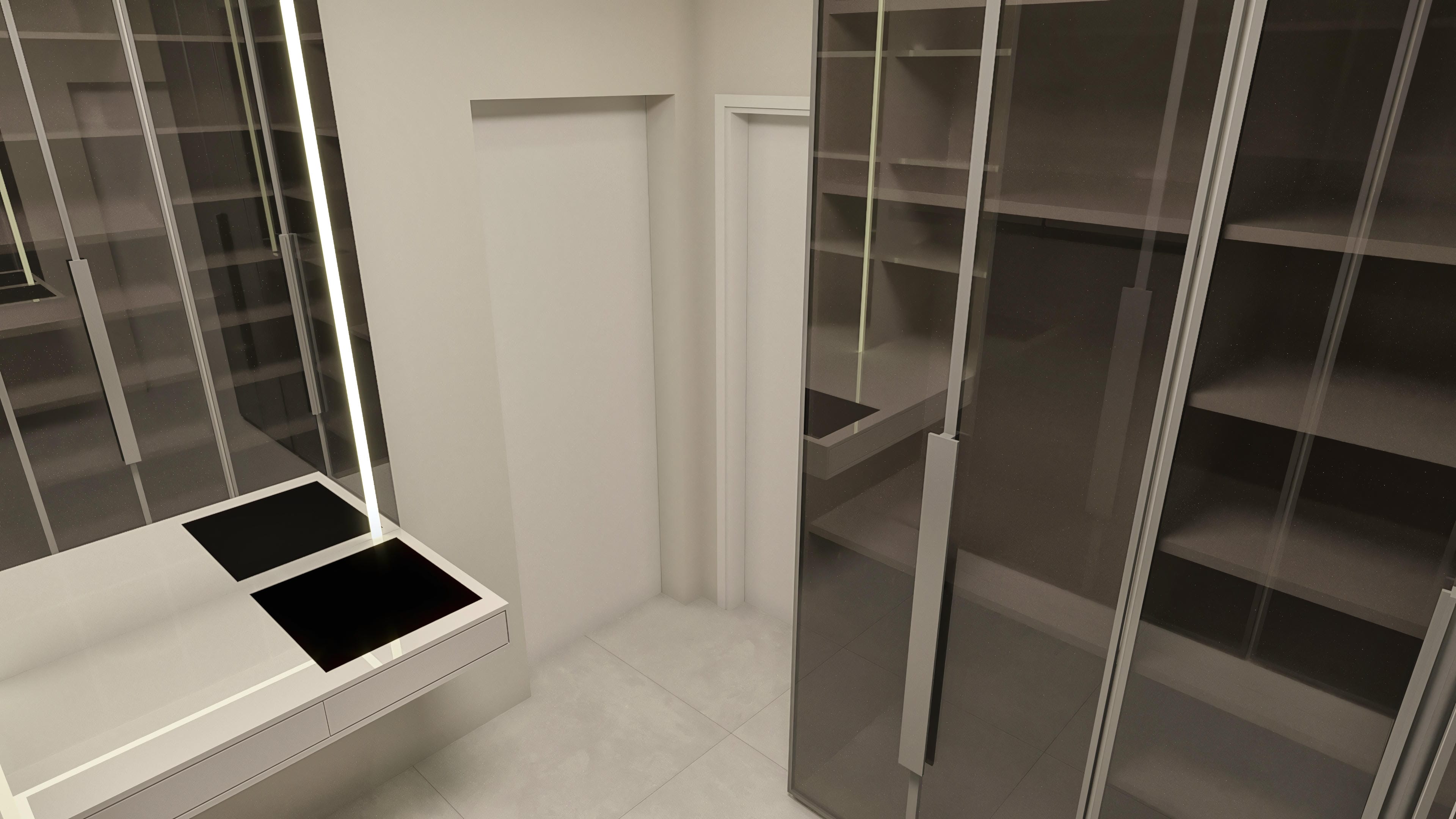 Detalle de un vestidor moderno con armarios grandes y espejados en tono oscuro, cajones integrados e iluminación lineal LED, mostrando un acabado sofisticado.