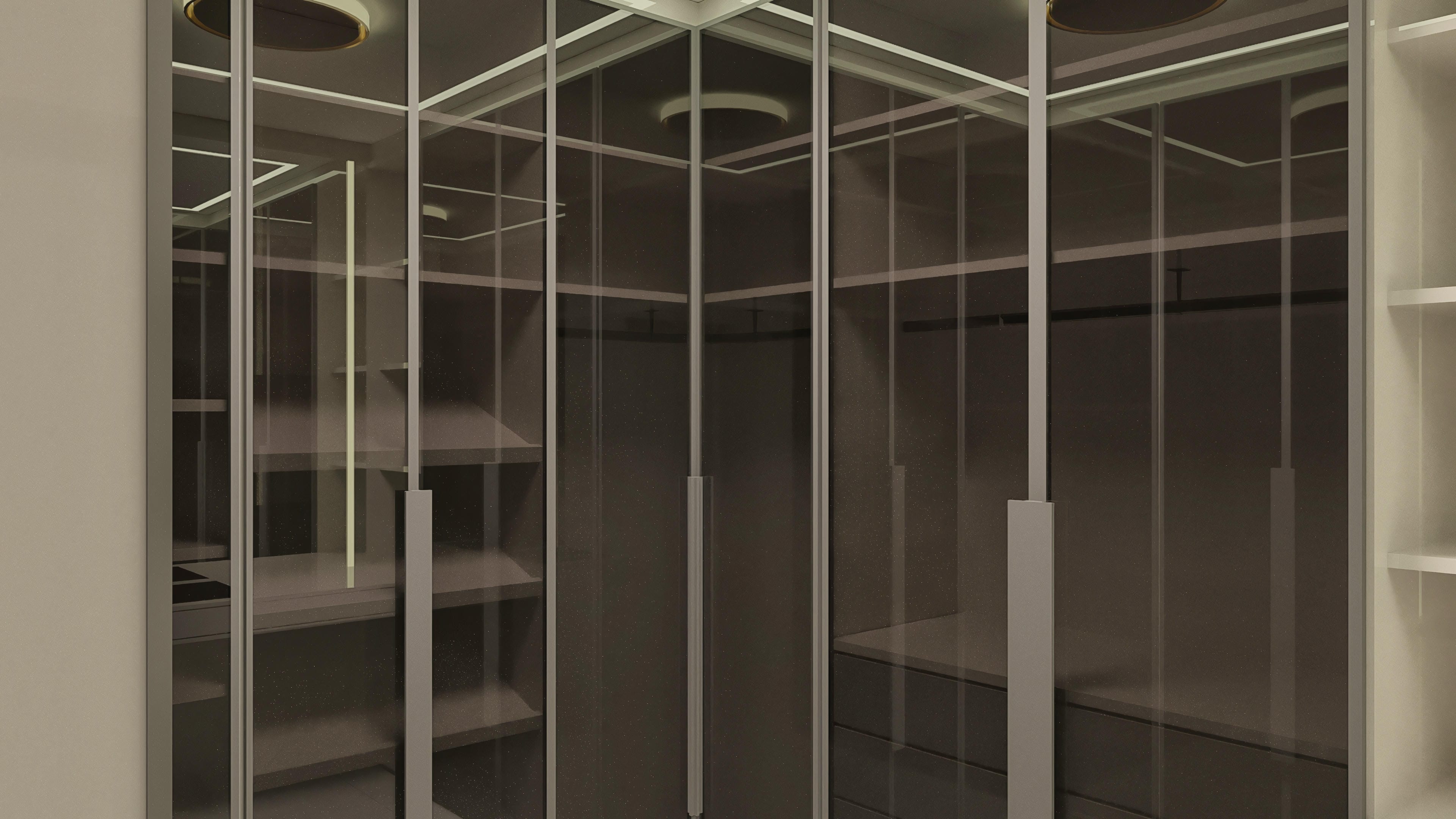 Details of a custom closet with mirrored doors and internal dividers, ideal for houses with suites and a home office.