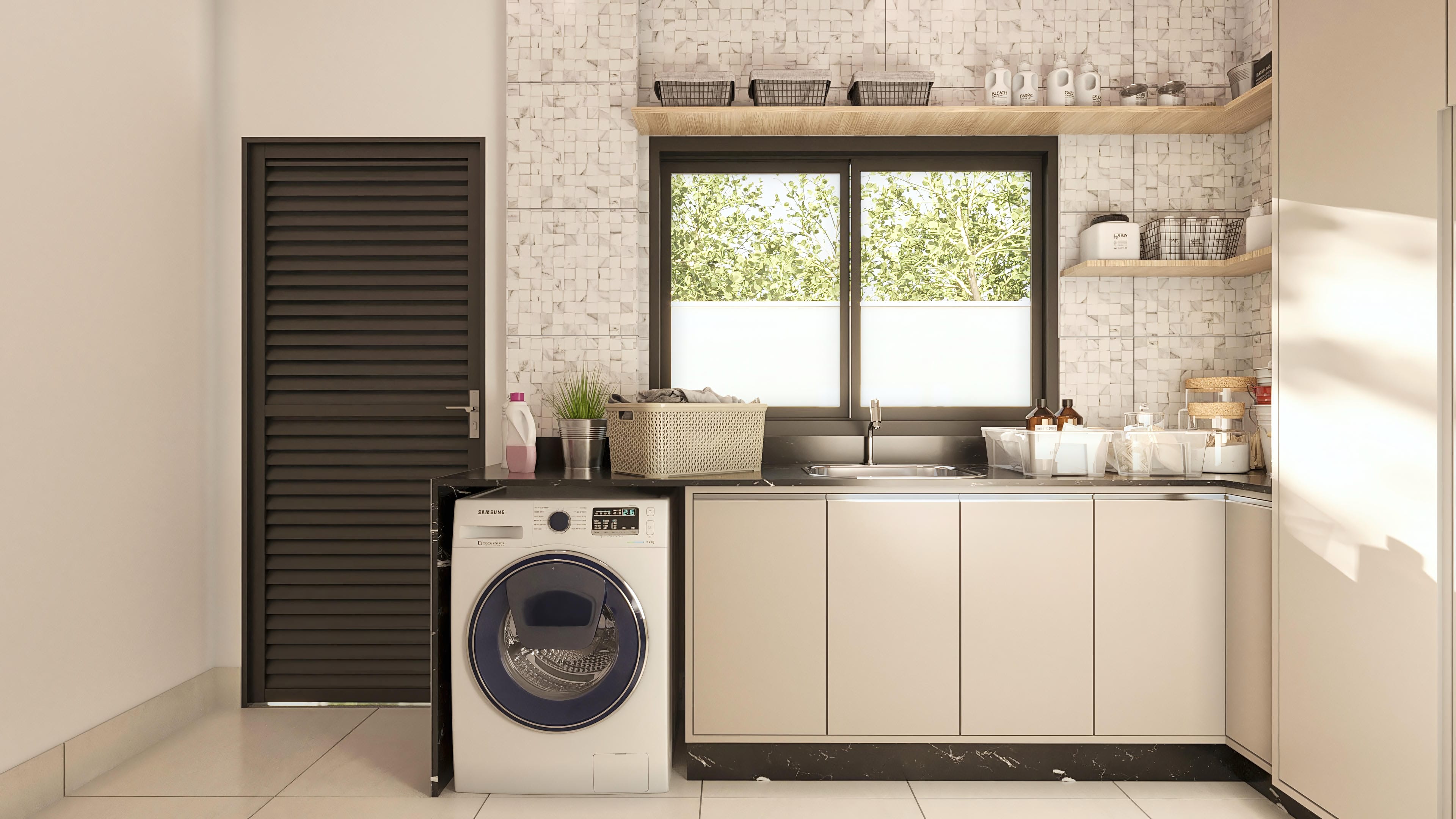 Detailed view of a modern laundry room with light cabinets, dark marble countertop, stainless steel sink, white washing machine, and louvered door.