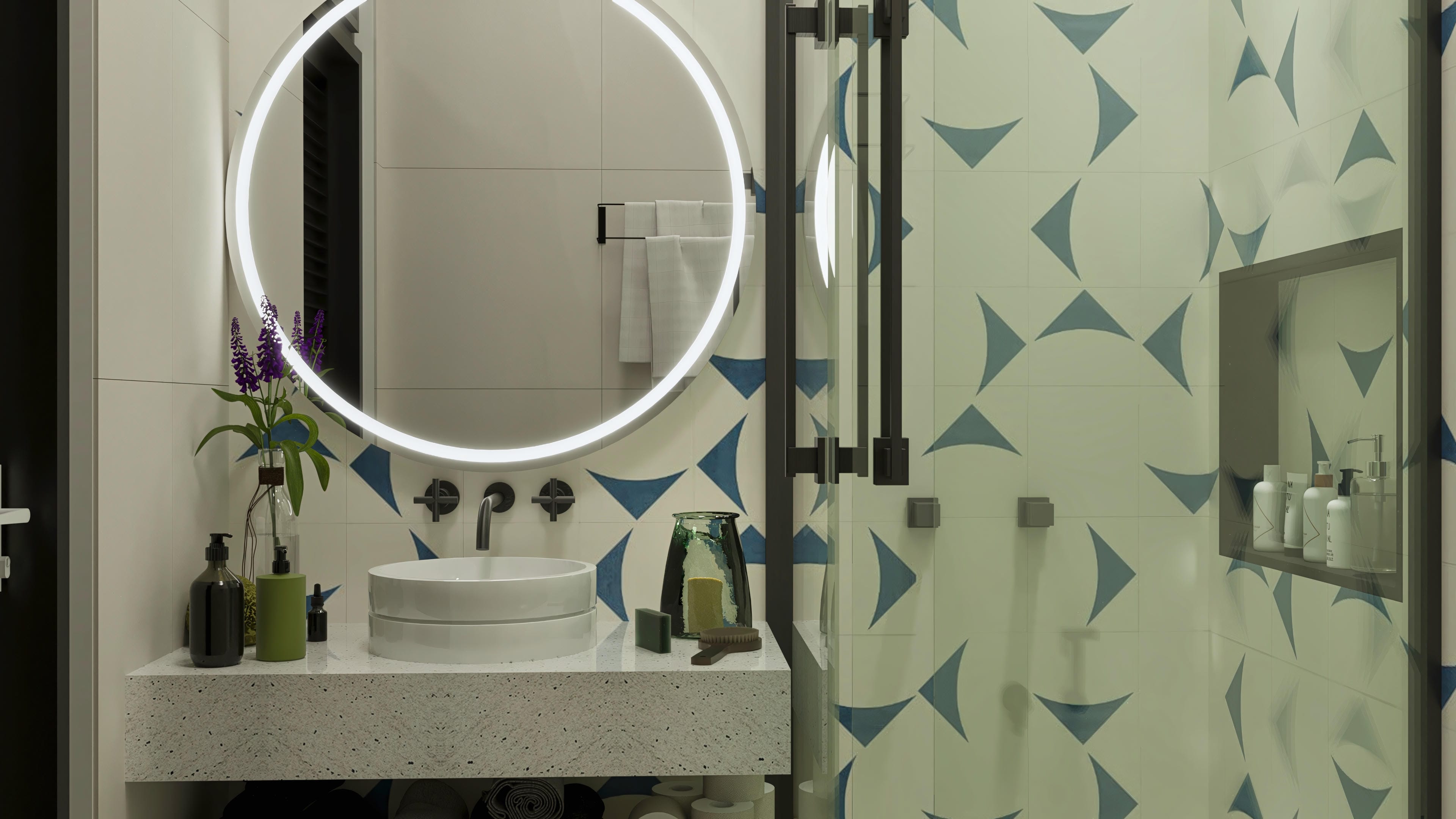 Interior of a modern bathroom with a vessel sink, mirror with LED lighting, and tiles with a blue geometric pattern in a two-story house.
